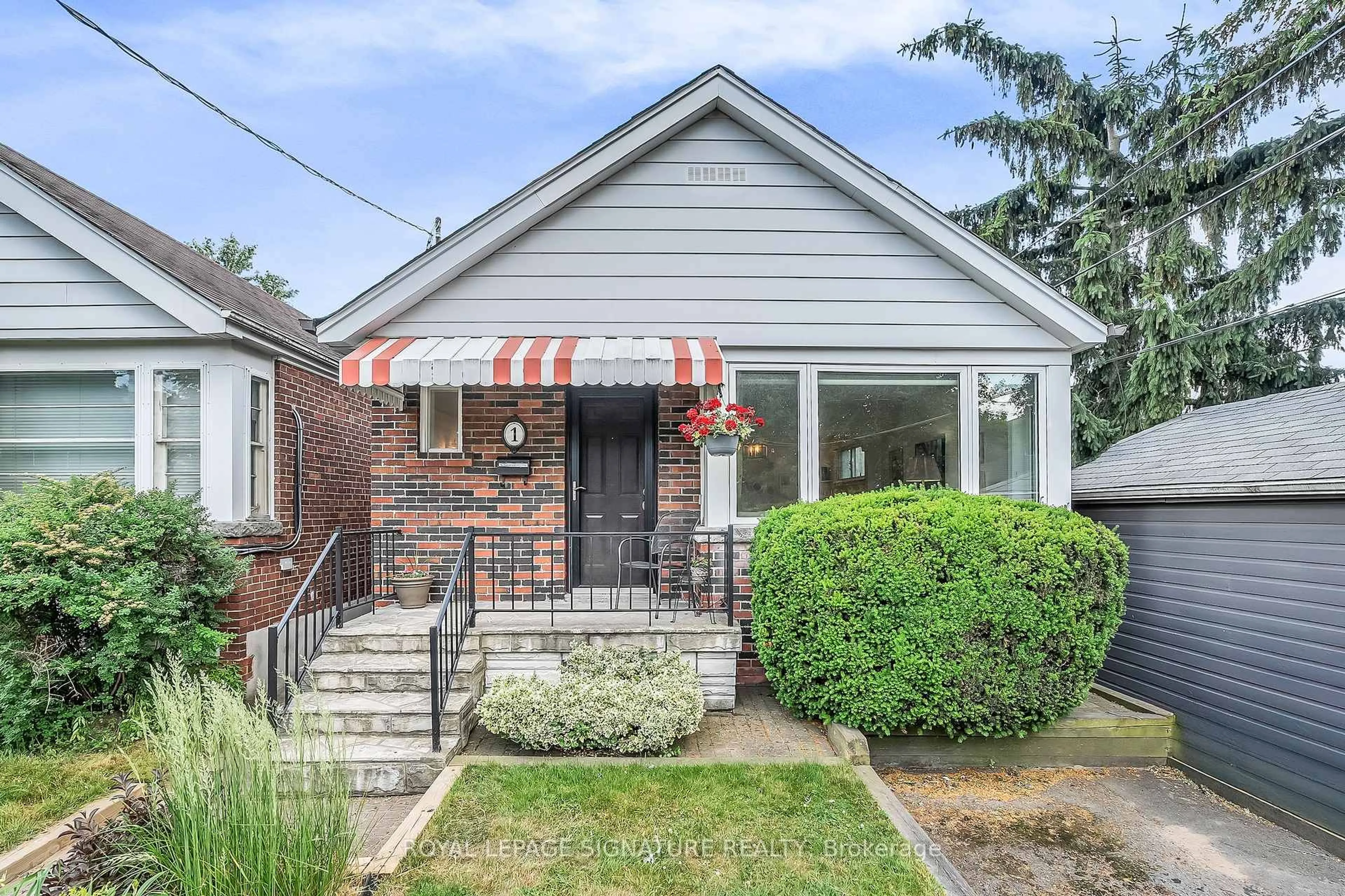 Home with brick exterior material, street for 1 Dieppe Rd, Toronto Ontario M4J 2K8