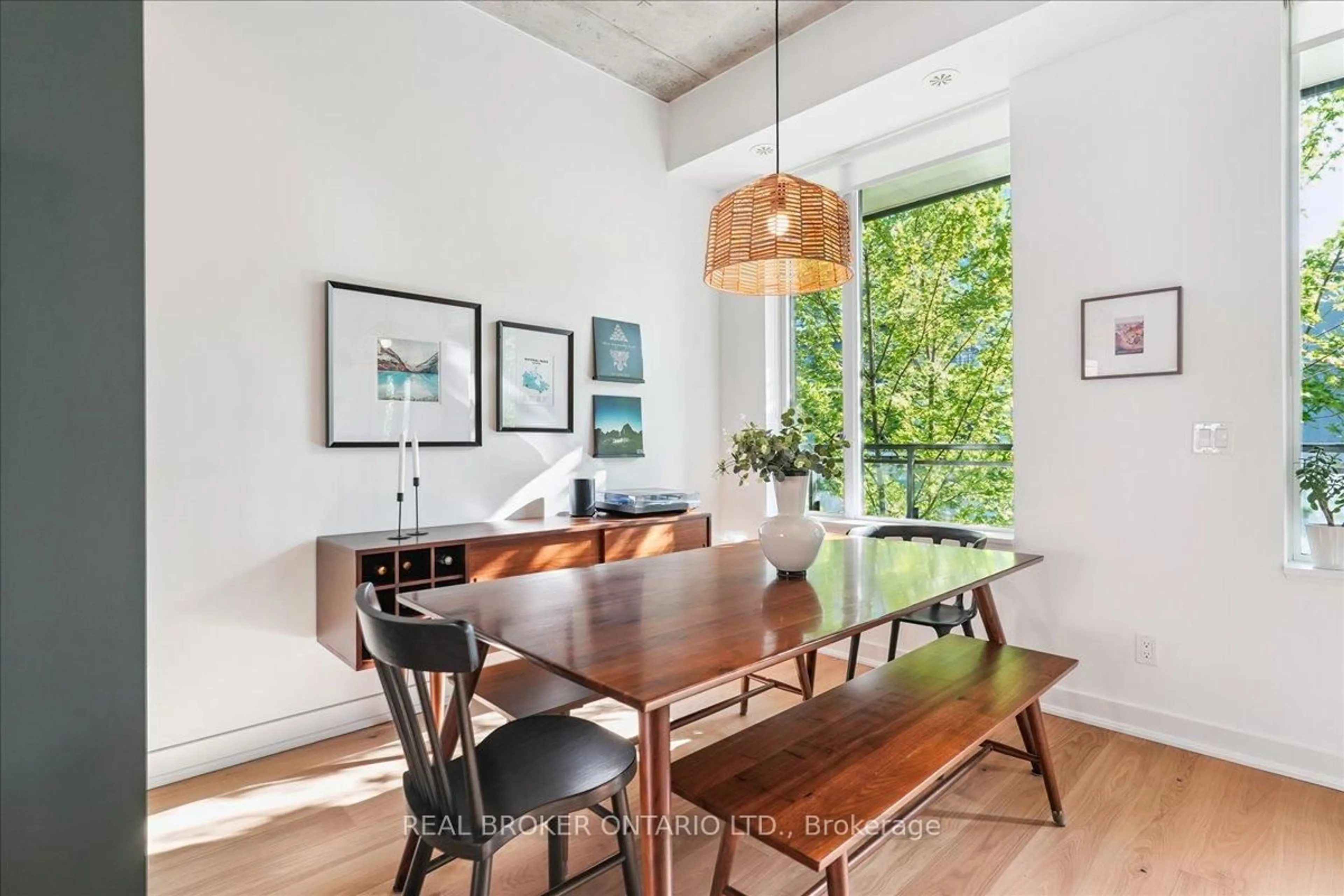 Dining room, wood/laminate floor for 1190 Dundas St #335, Toronto Ontario M4M 0C5
