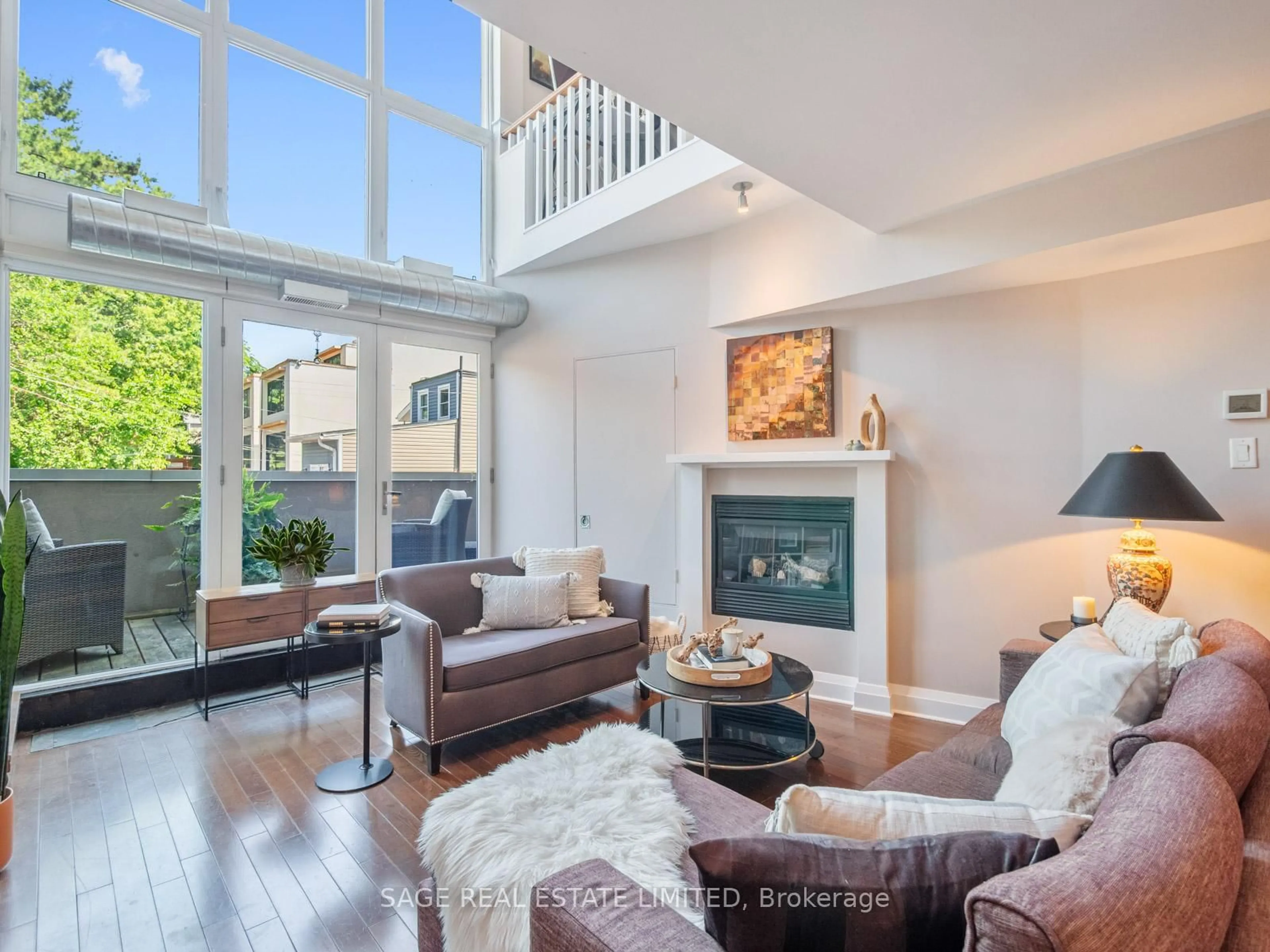 Living room with furniture, unknown for 2012 Queen St #204, Toronto Ontario M4L 1J3