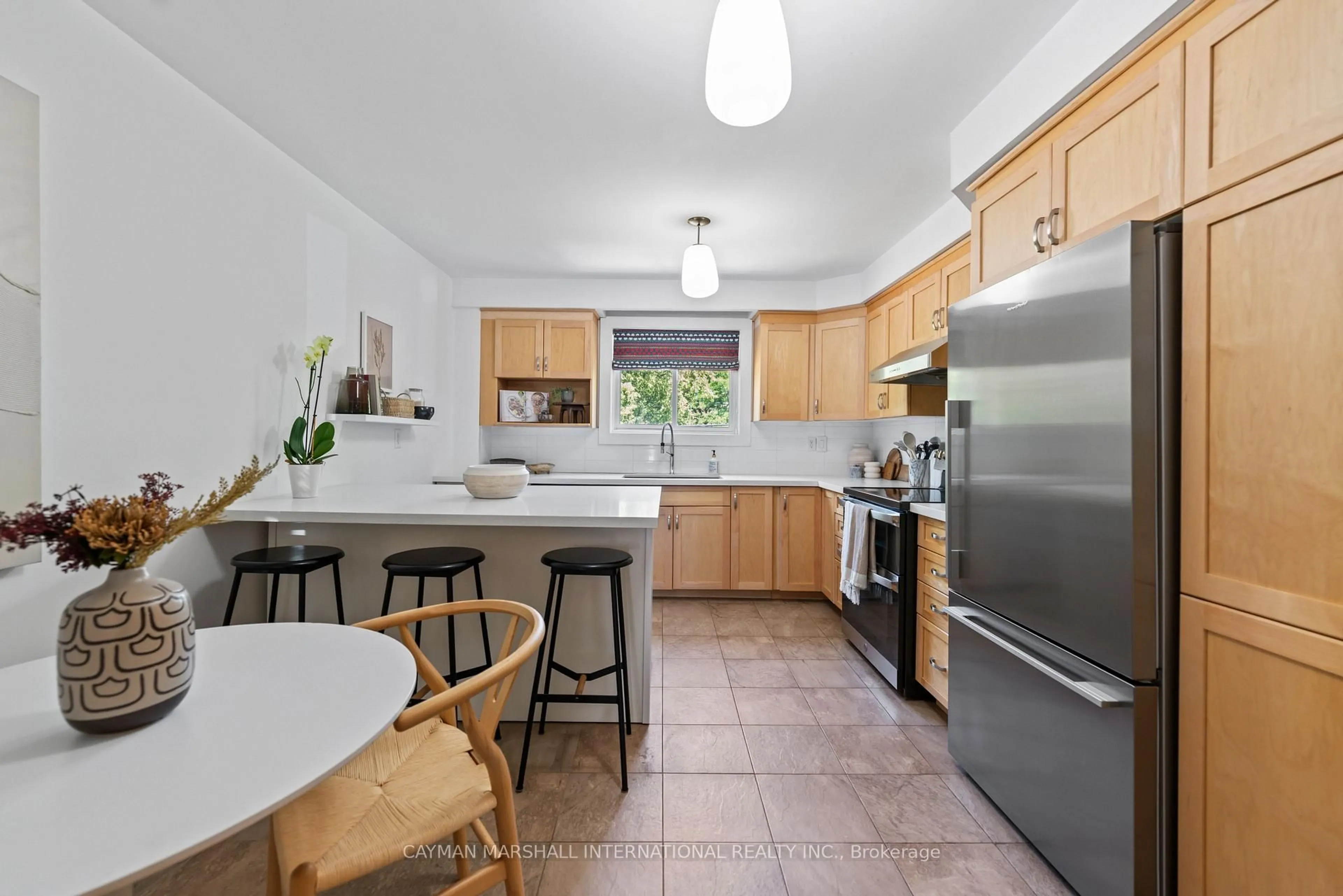 Standard kitchen, ceramic/tile floor for 467 Rhodes Ave, Toronto Ontario M4L 3A6