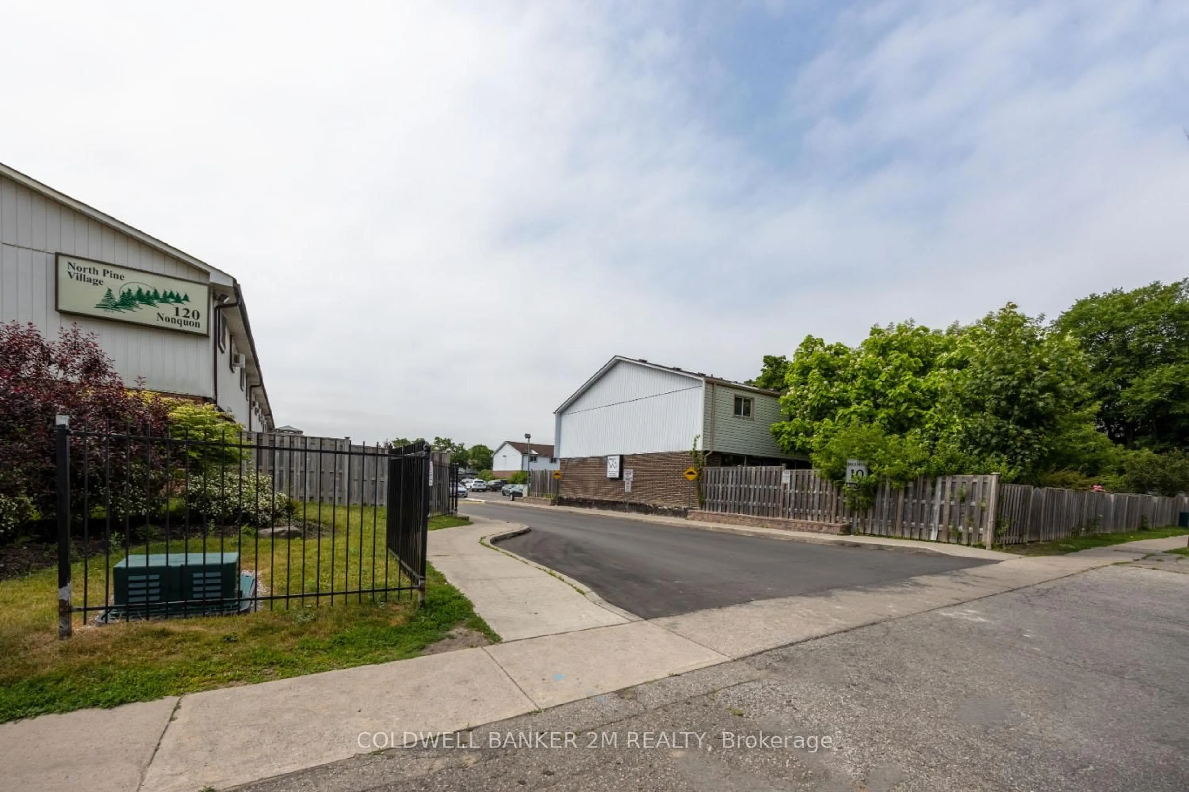 A pic from outside/outdoor area/front of a property/back of a property/a pic from drone, street for 120 Nonquon Rd #180, Oshawa Ontario L1G 7E6