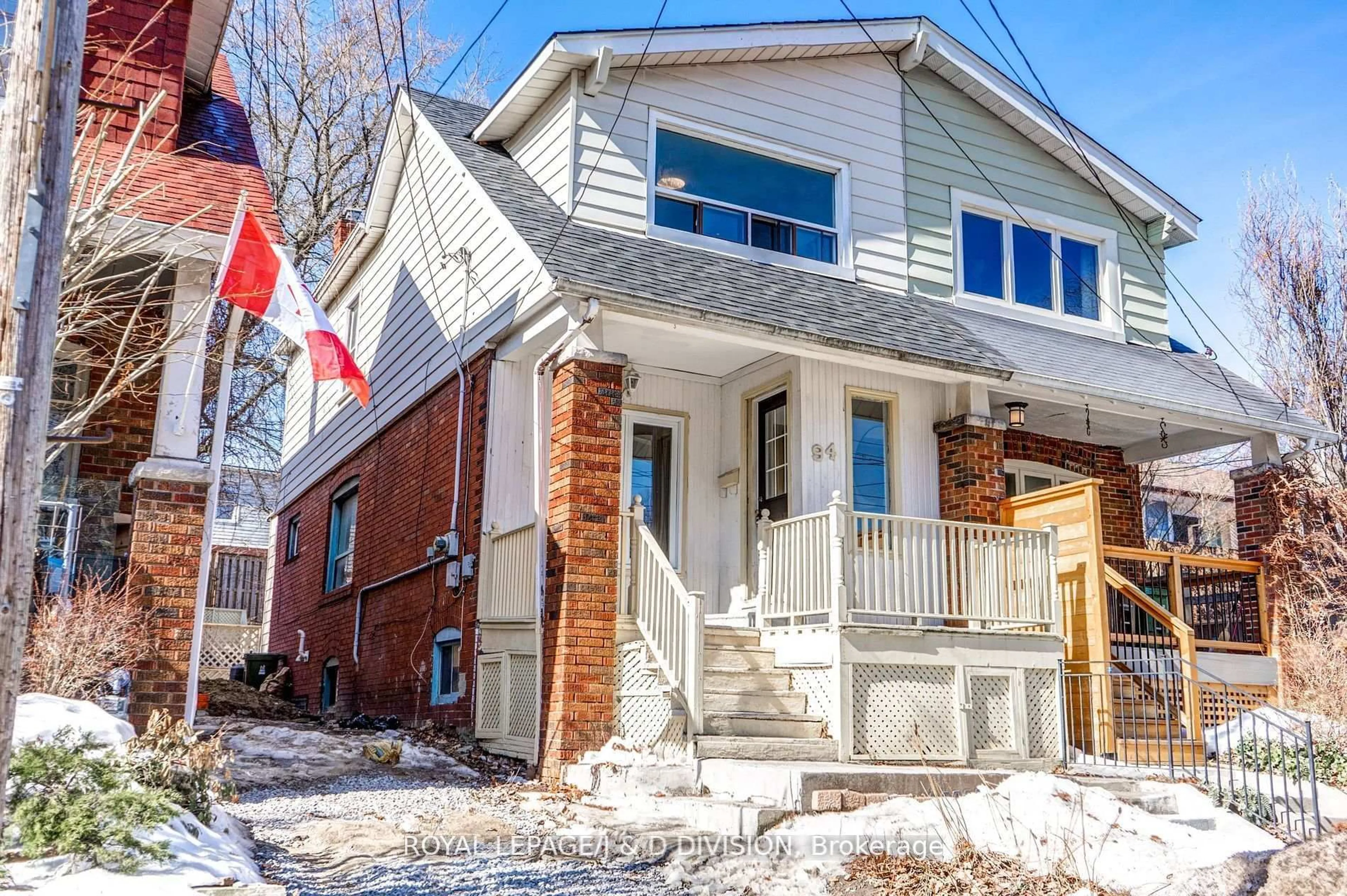 Home with brick exterior material, street for 94 Brookside Dr, Toronto Ontario M4E 2M1