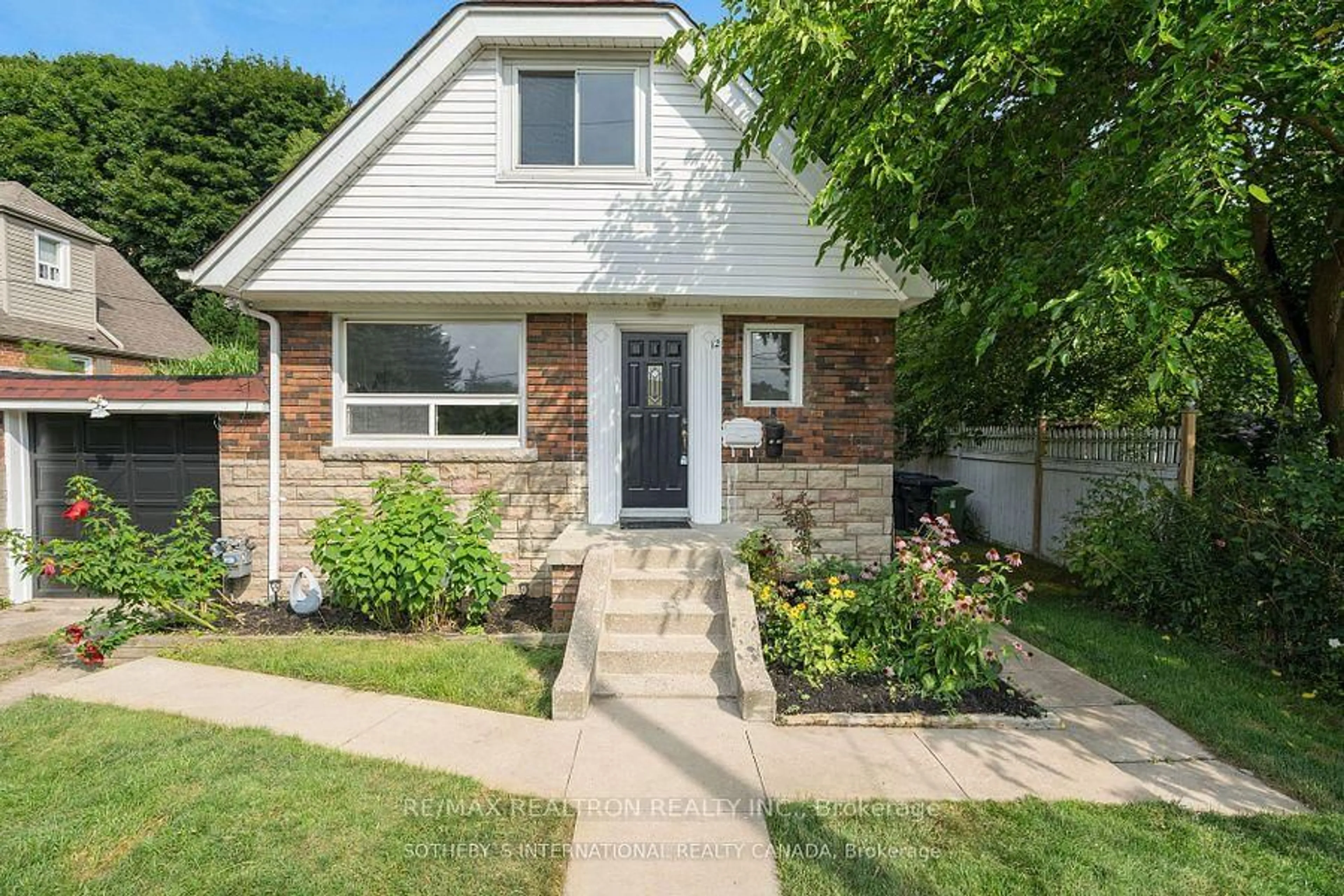 Home with brick exterior material, street for 12 Sonora Terr, Toronto Ontario M1N 1H8