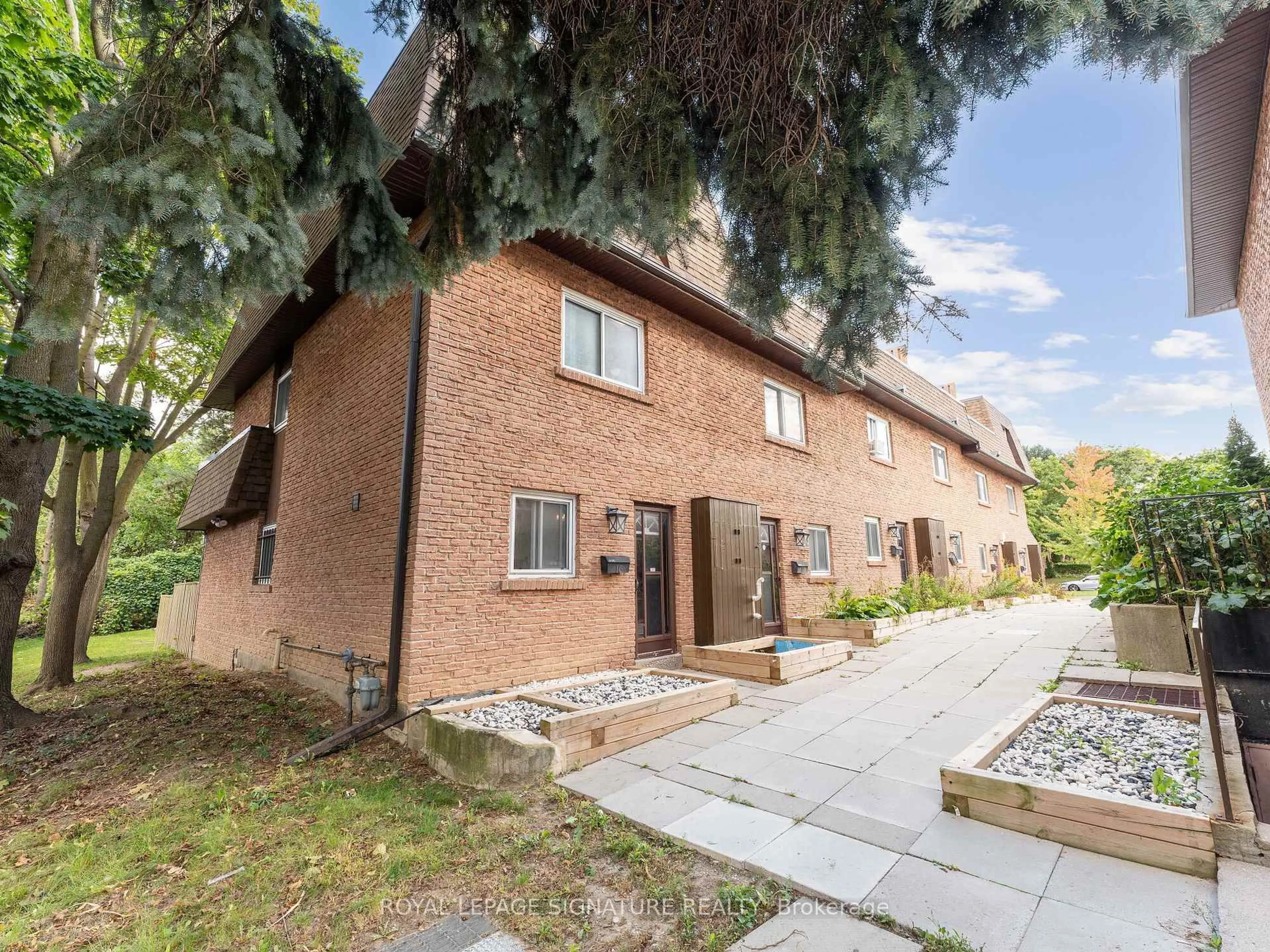 Home with brick exterior material, street for 20 Hainford St #16, Toronto Ontario M1E 4Y5