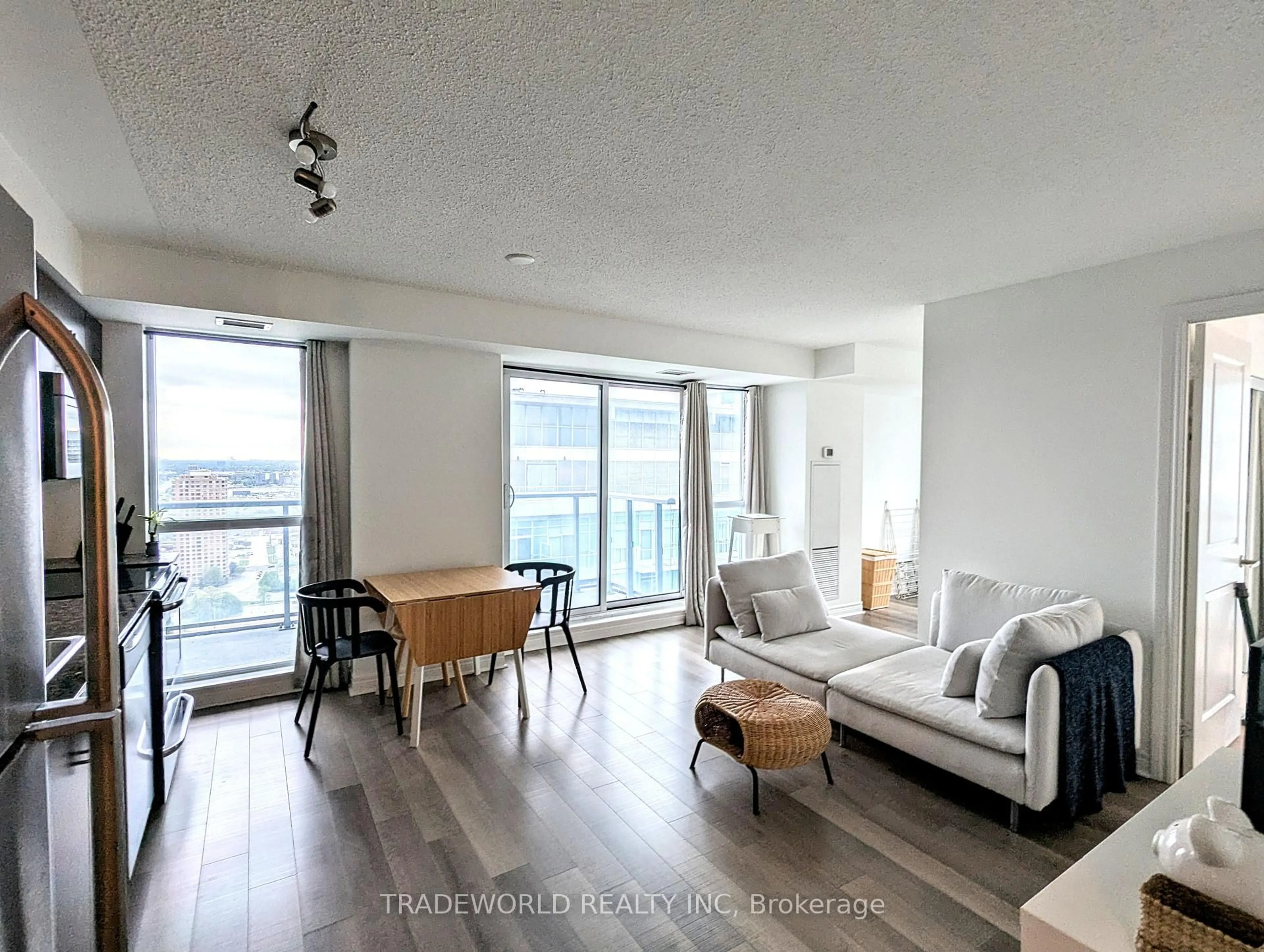 Living room with furniture, wood/laminate floor for 50 Town Centre Crt #3304, Toronto Ontario M1P 0A9