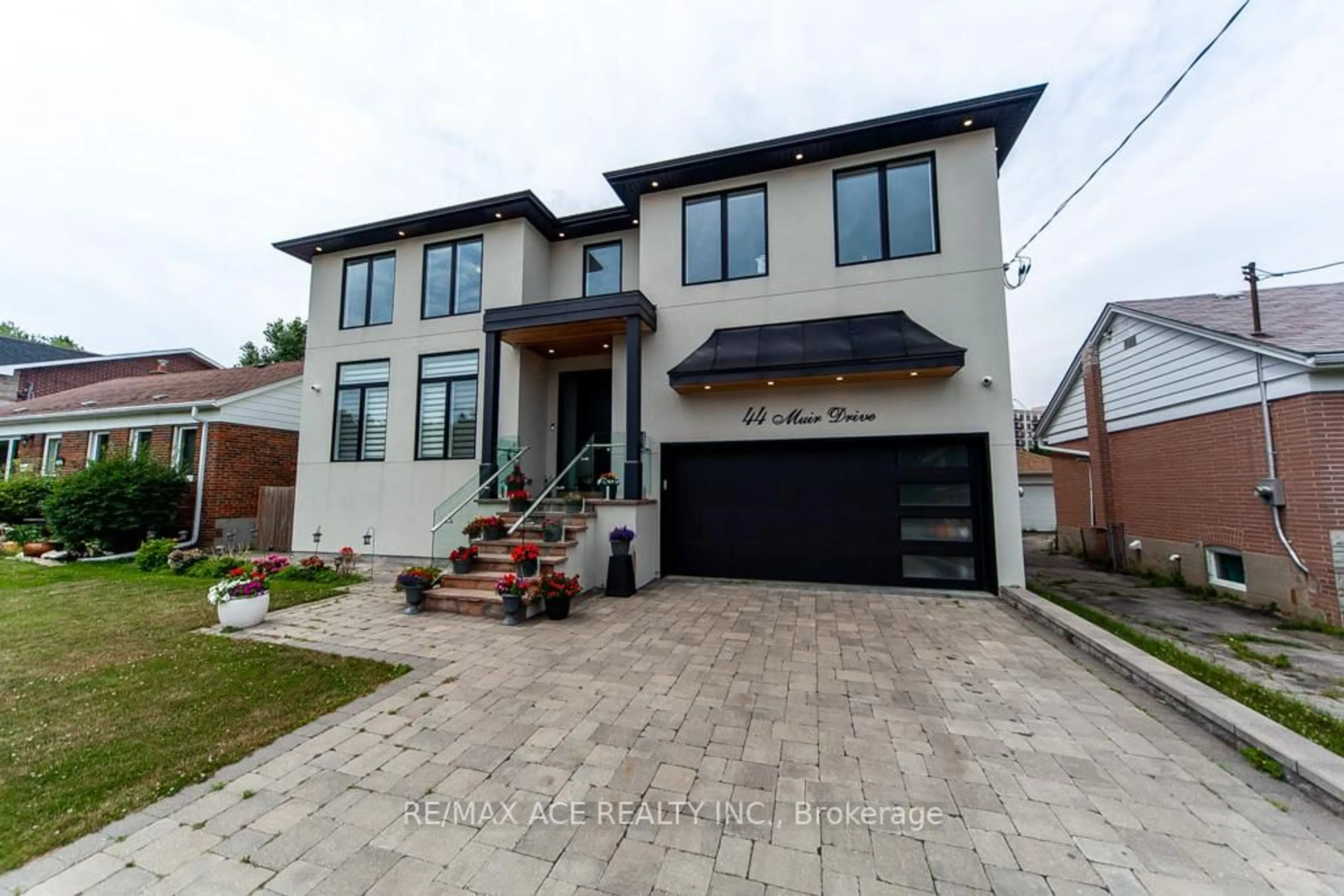 Home with brick exterior material, street for 44 Muir Dr, Toronto Ontario M1M 3B4