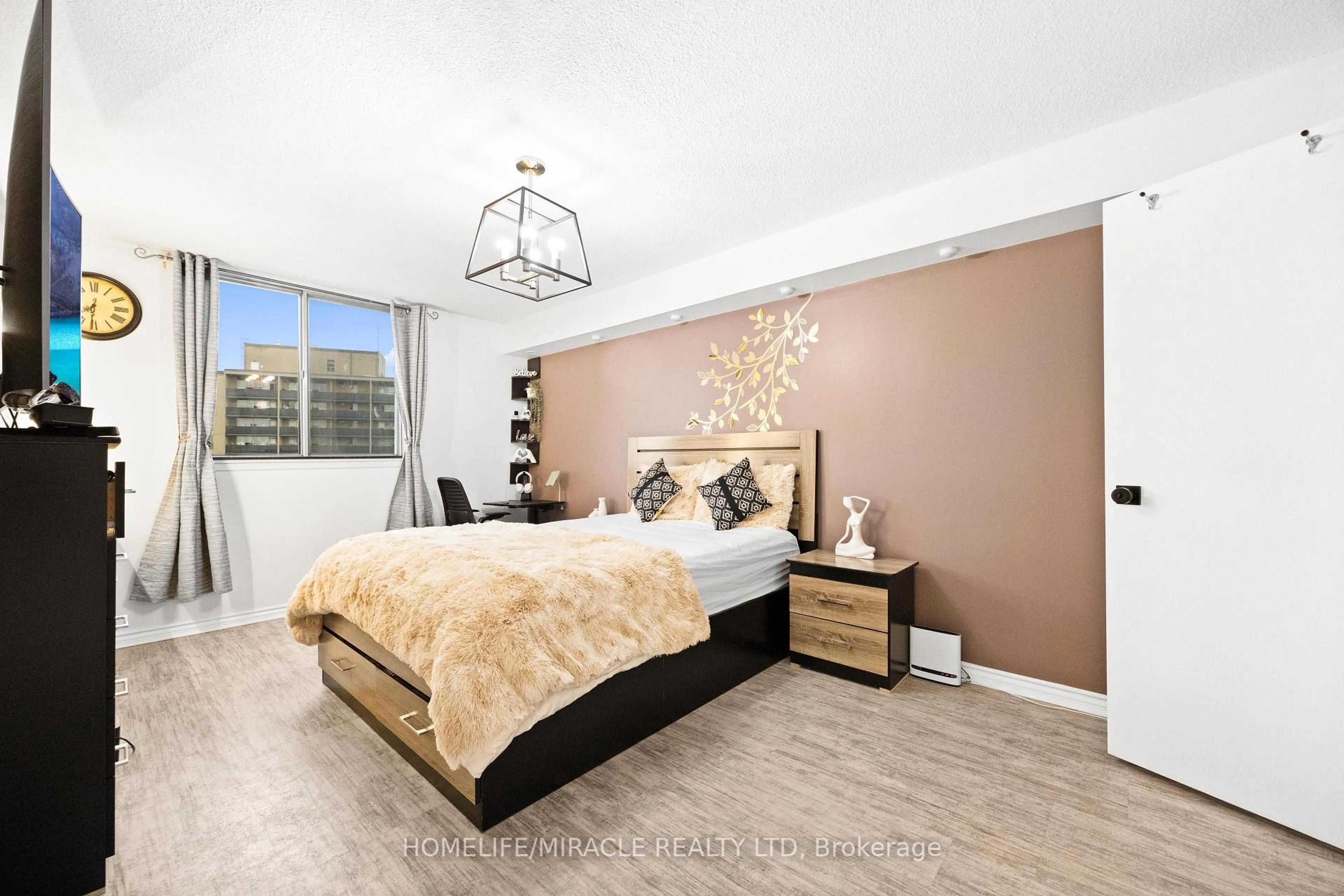 Bedroom with bed, wood/laminate floor for 120 Dundalk Dr, Toronto Ontario M1P 4V9