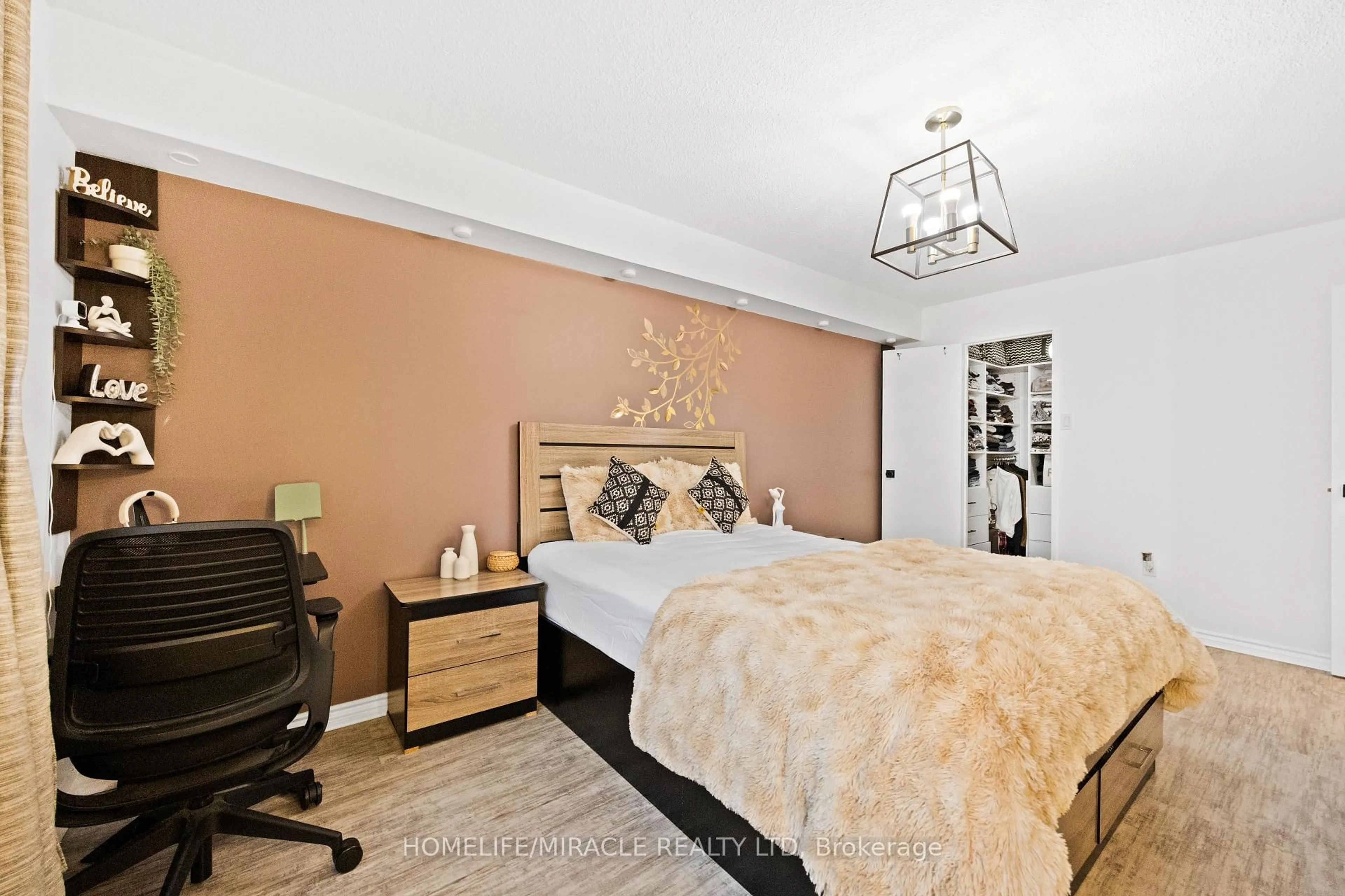 Bedroom with bed, wood/laminate floor for 120 Dundalk Dr, Toronto Ontario M1P 4V9