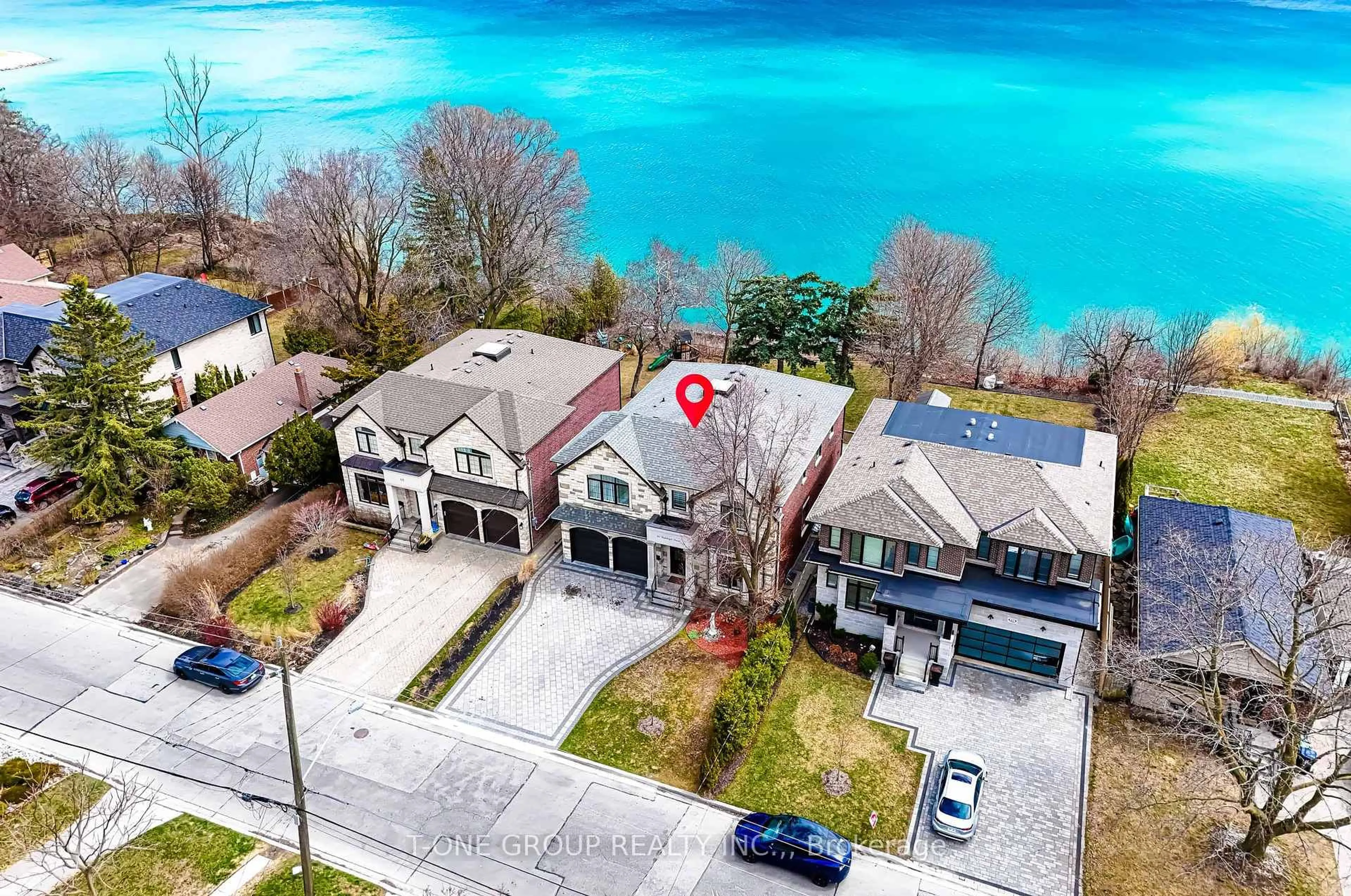 A pic from outside/outdoor area/front of a property/back of a property/a pic from drone, water/lake/river/ocean view for 63 Fishleigh Dr, Toronto Ontario M1N 1H3