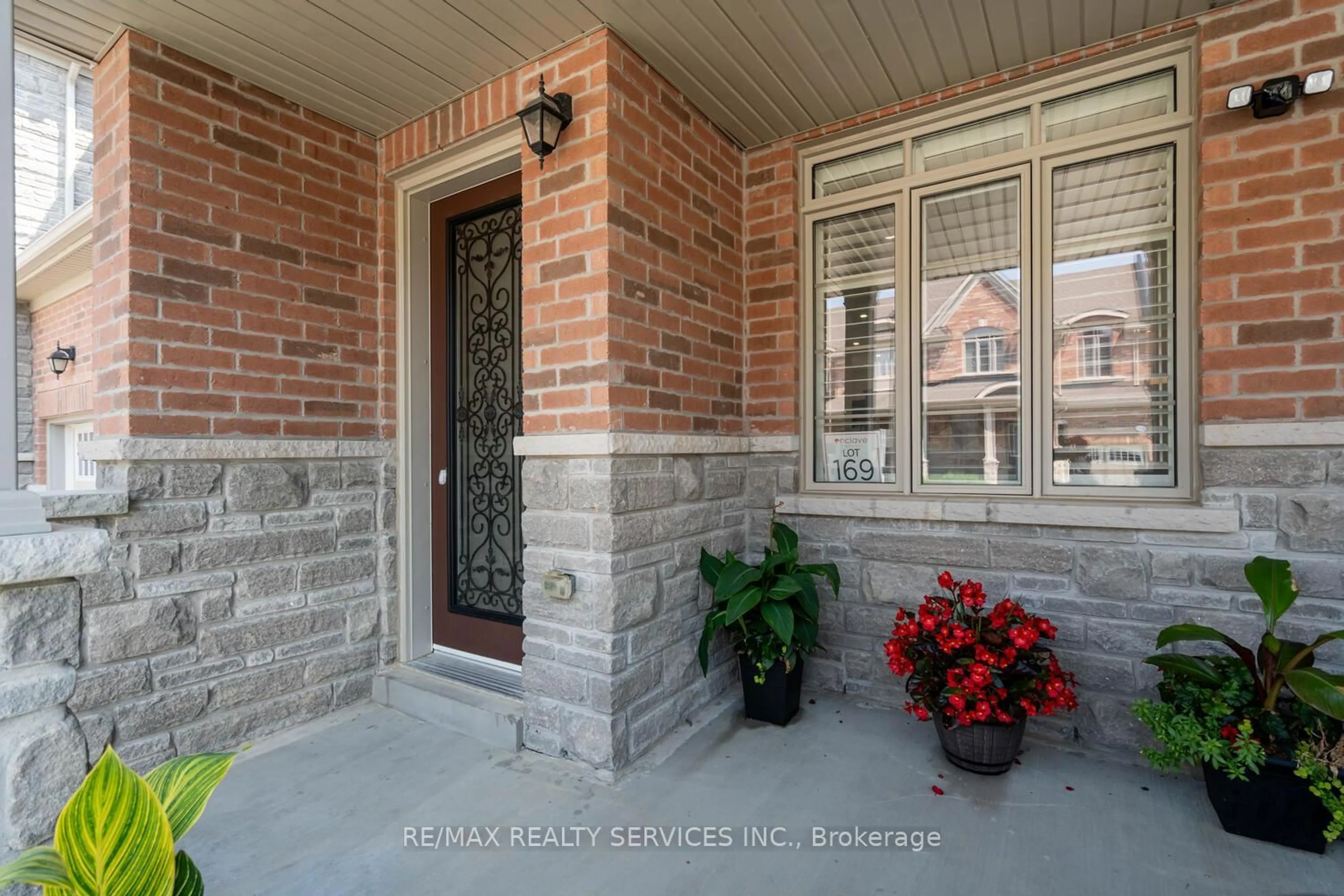 Home with brick exterior material, street for 33 Hickling Lane, Ajax Ontario L1T 0P9
