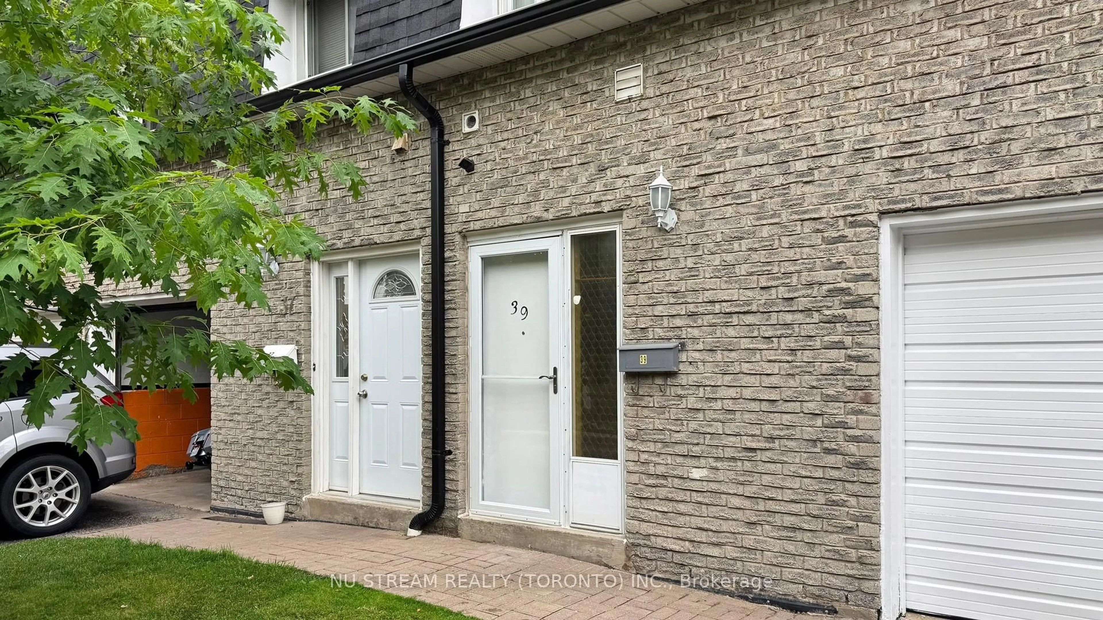 Home with brick exterior material, street for 3075 Bridletowne Circ #39, Toronto Ontario M1W 1S8