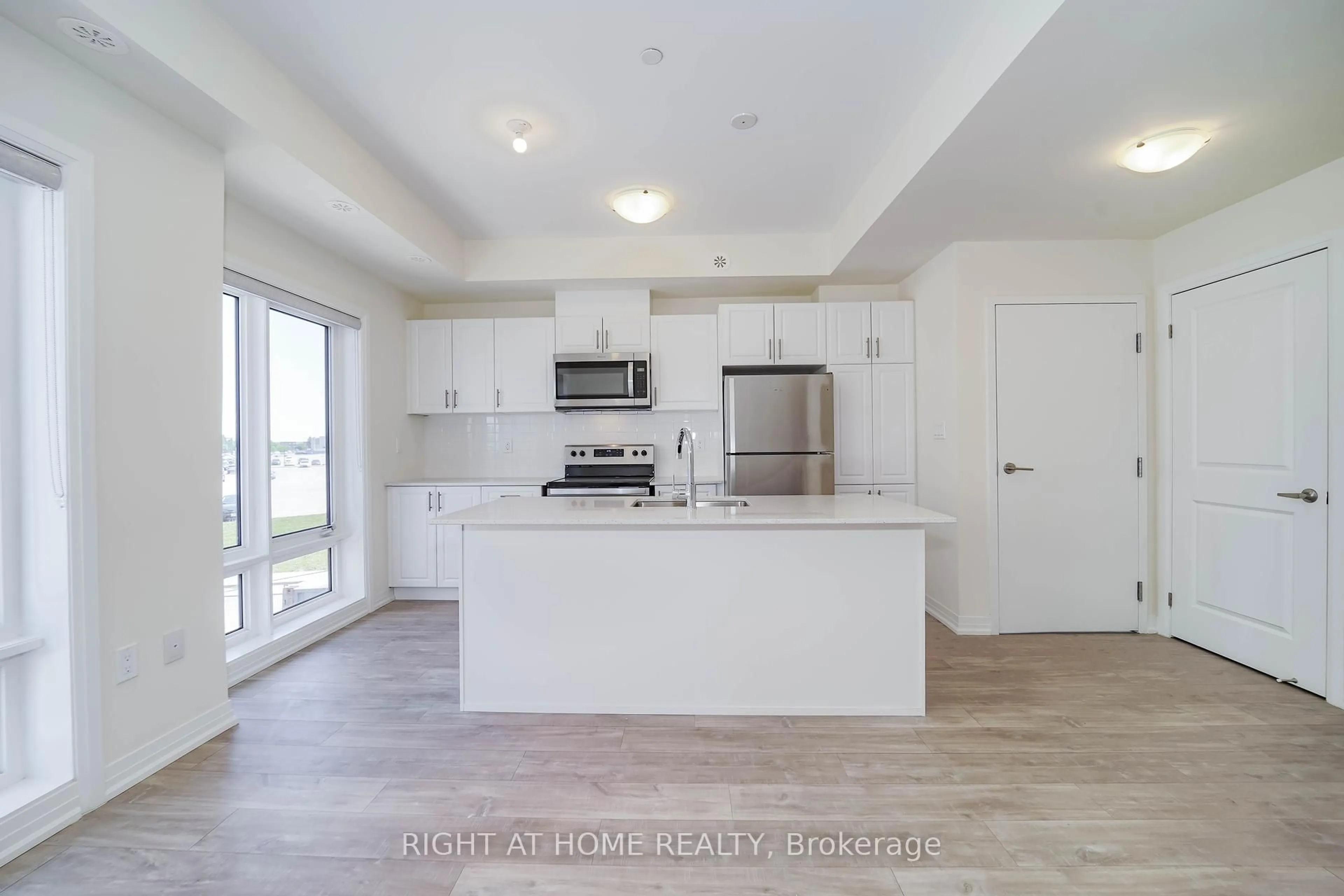 Open concept kitchen, unknown for 145 Tapscott Rd #4, Toronto Ontario M1B 0E8