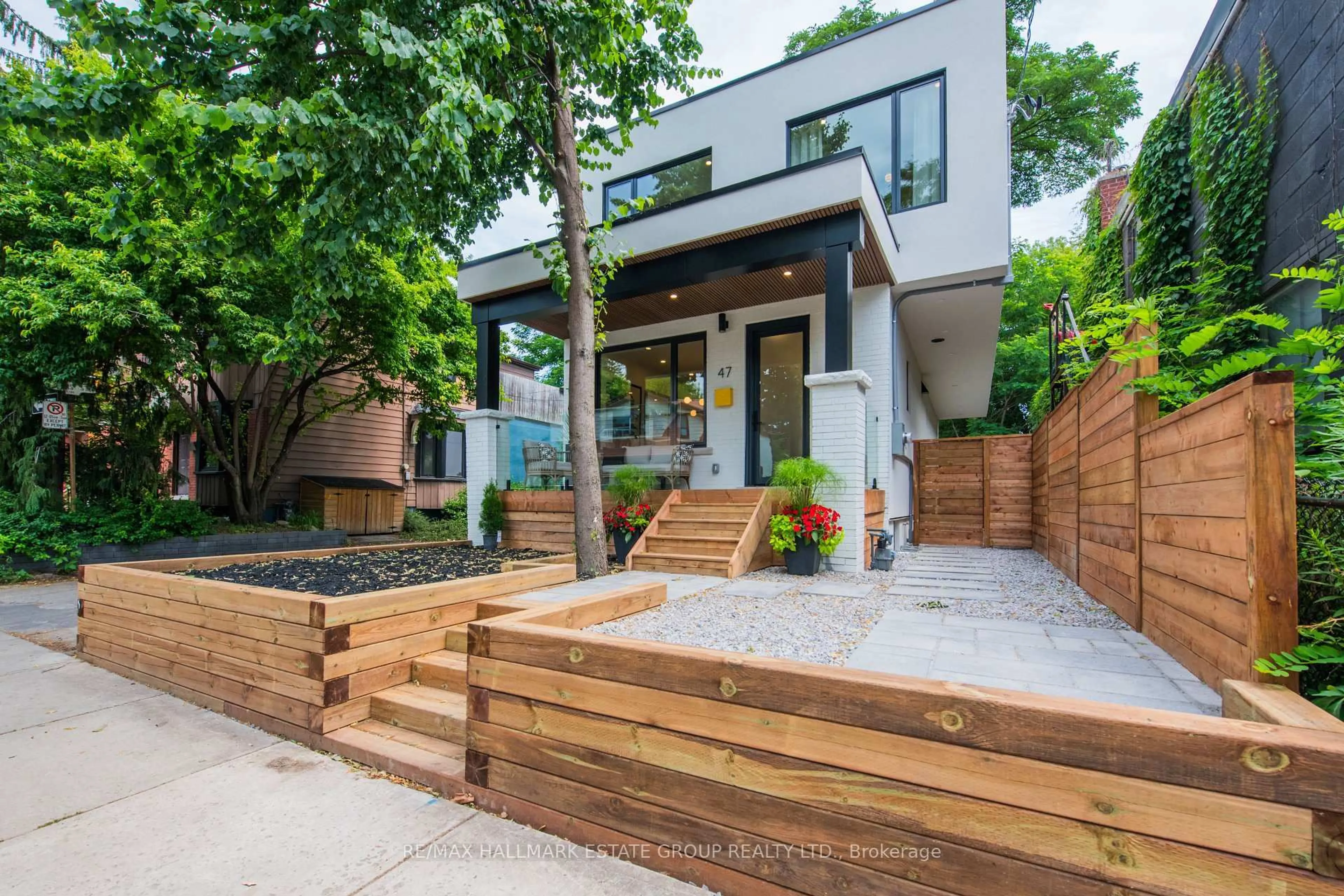 Home with brick exterior material, street for 47 Laing St, Toronto Ontario M4L 2N3