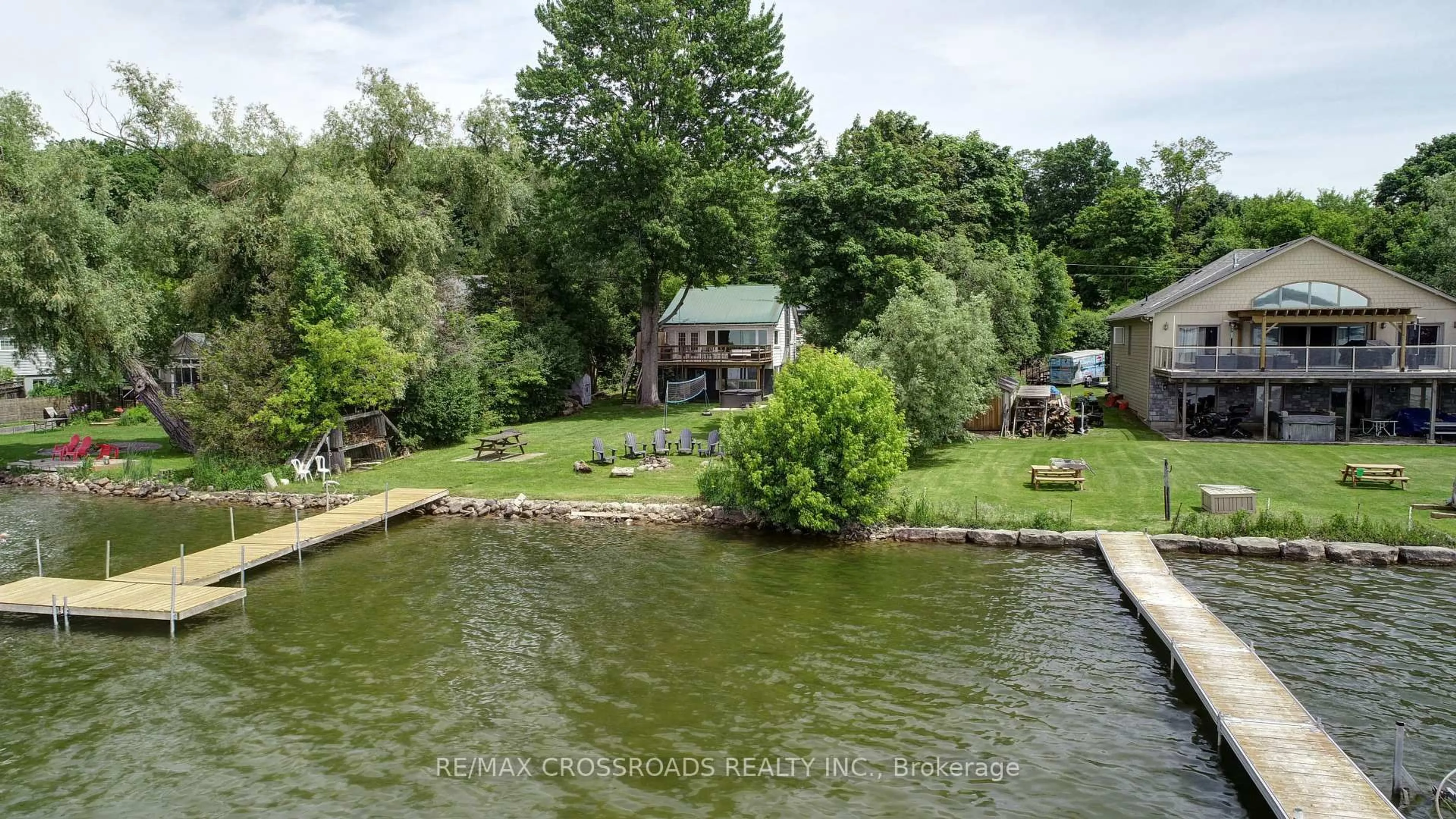 A pic from outside/outdoor area/front of a property/back of a property/a pic from drone, water/lake/river/ocean view for 70 Williams Point Rd, Scugog Ontario L0B 1E0