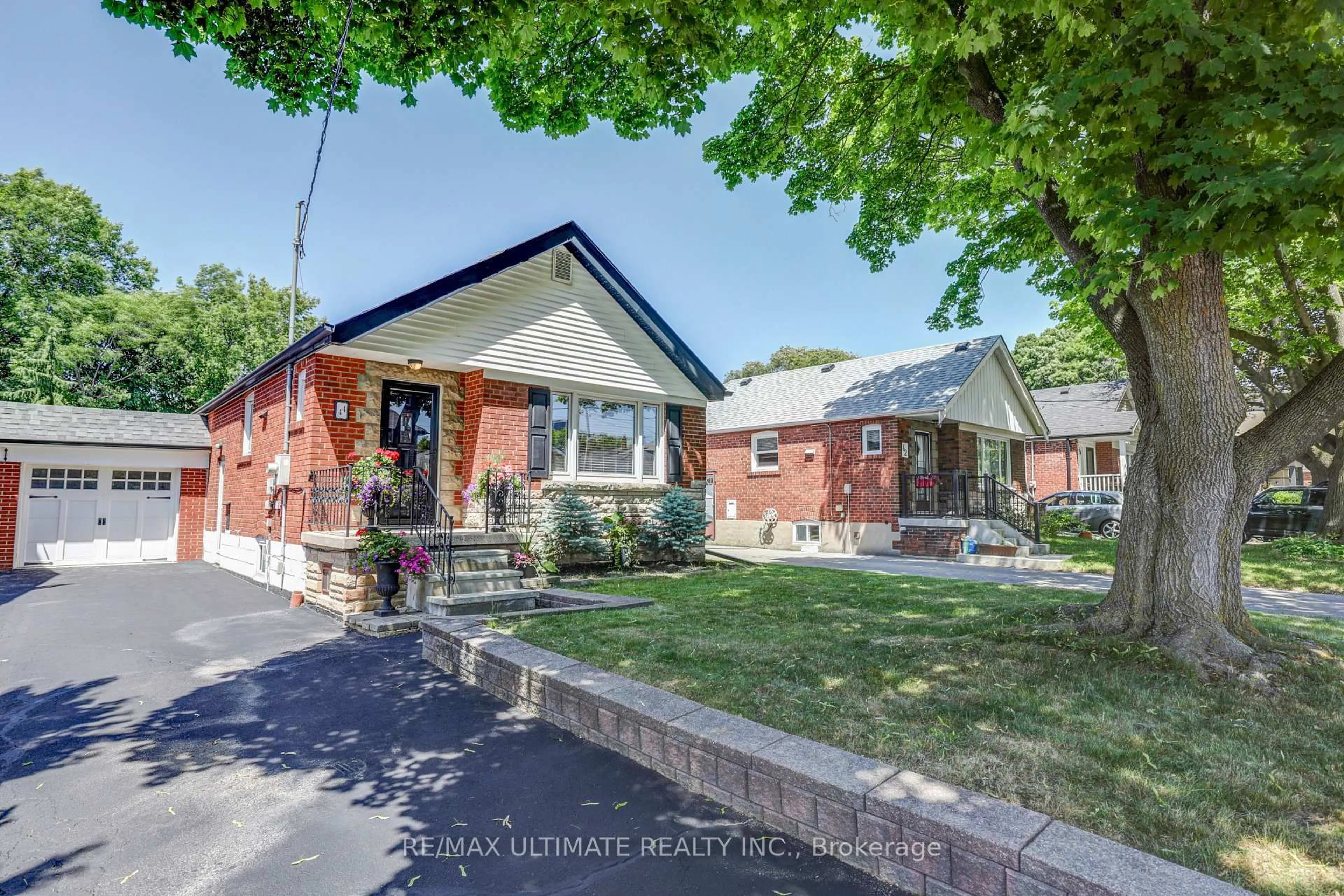 Home with brick exterior material, street for 44 Ferris Rd, Toronto Ontario M4B 1G3