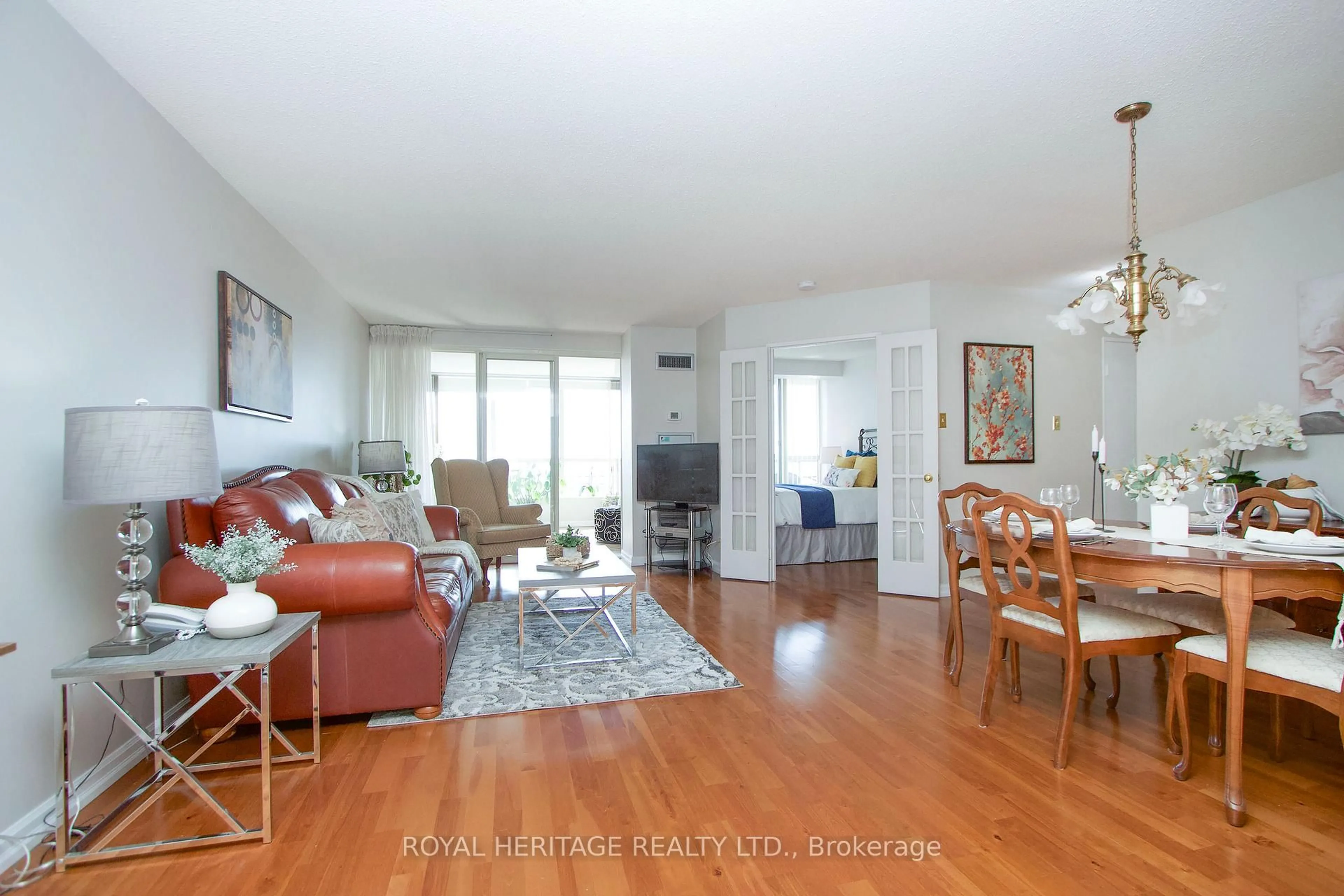 Living room with furniture, wood/laminate floor for 1890 Valley Farm Rd #1011, Pickering Ontario L1V 6B4