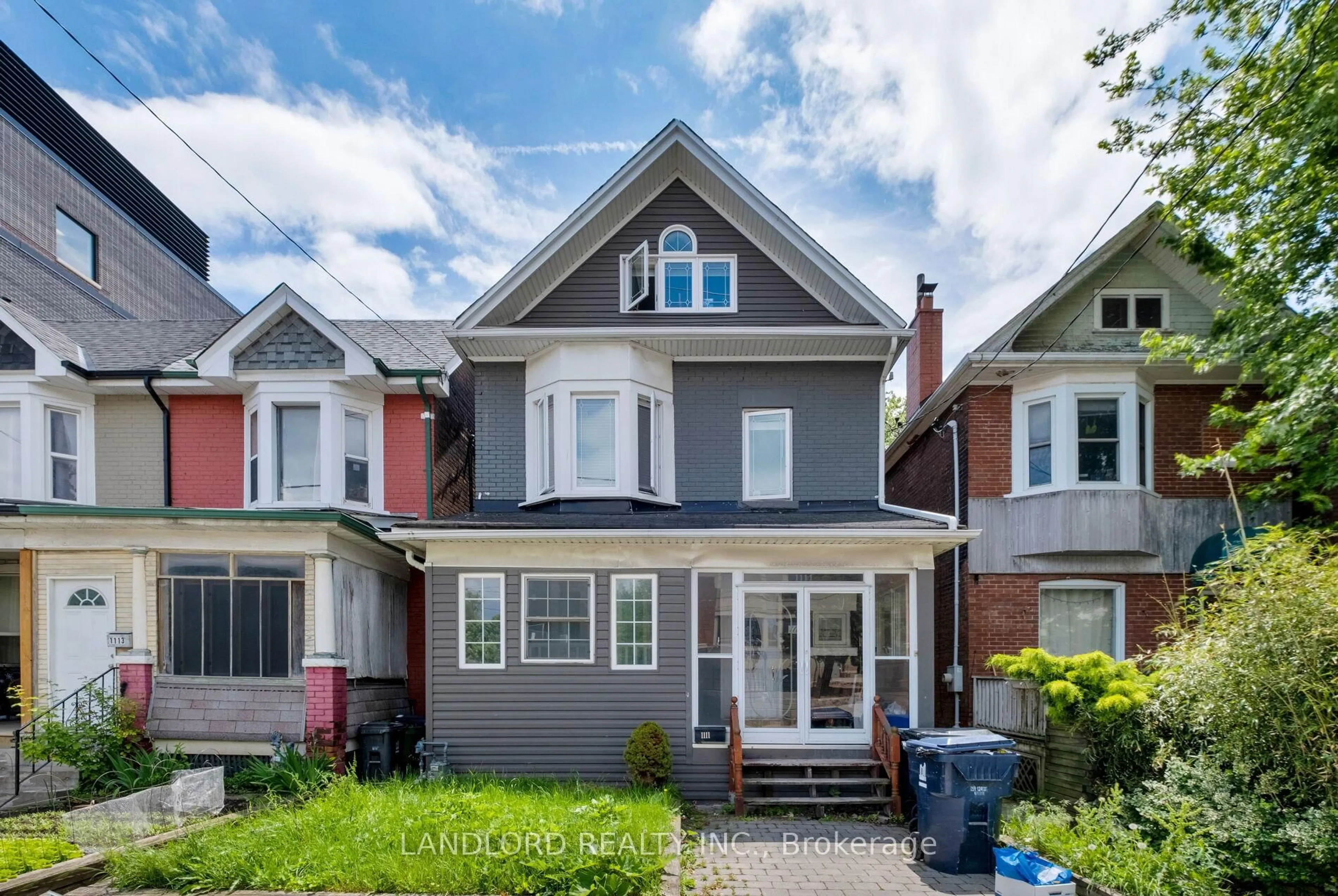Home with brick exterior material, street for 1111 Gerrard St, Toronto Ontario M4M 1Z9