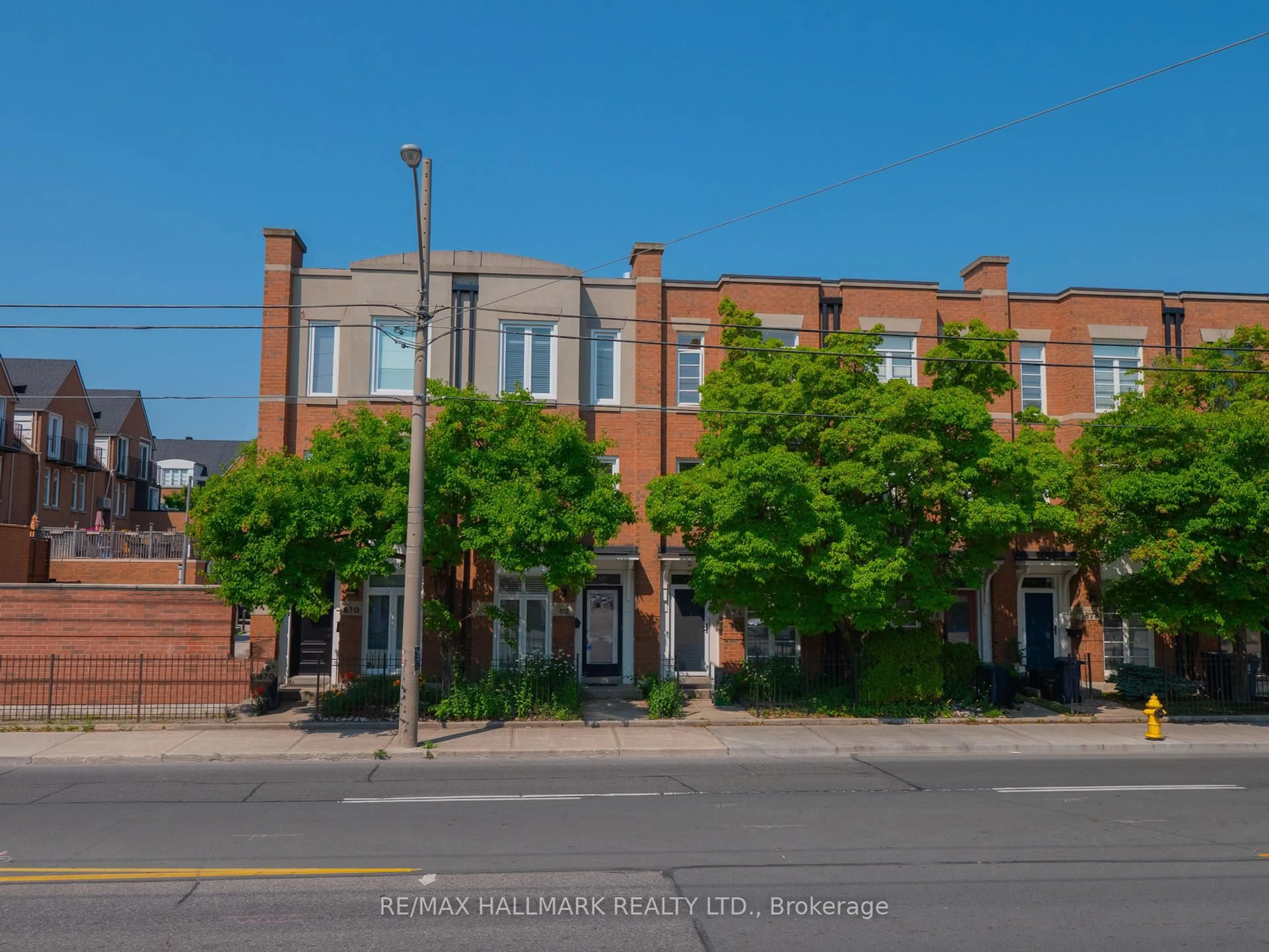 A pic from outside/outdoor area/front of a property/back of a property/a pic from drone, street for 872 Pape Ave, Toronto Ontario M4K 3T8