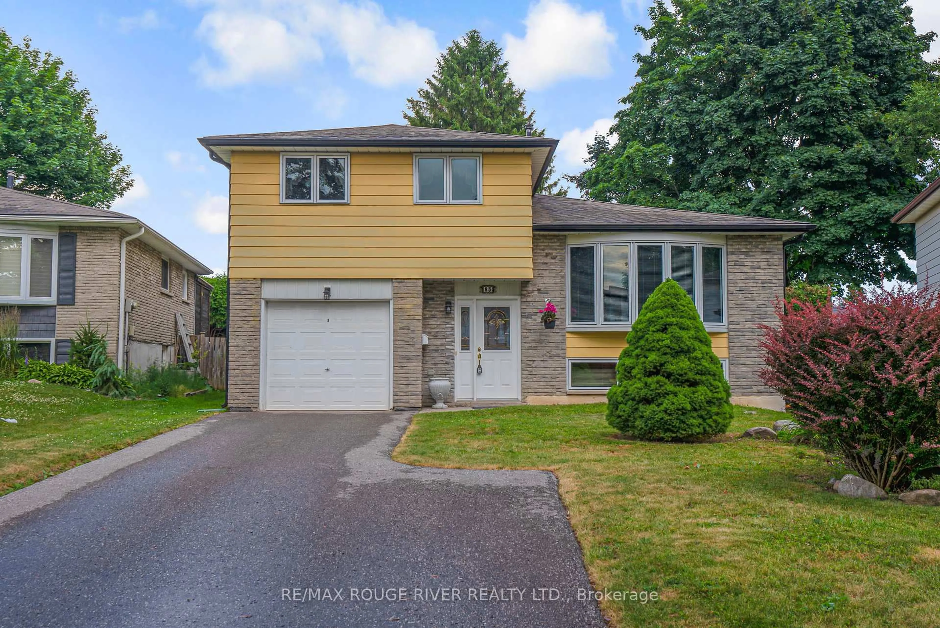 Home with vinyl exterior material, street for 83 Oakdale Dr, Oshawa Ontario L1H 6W9