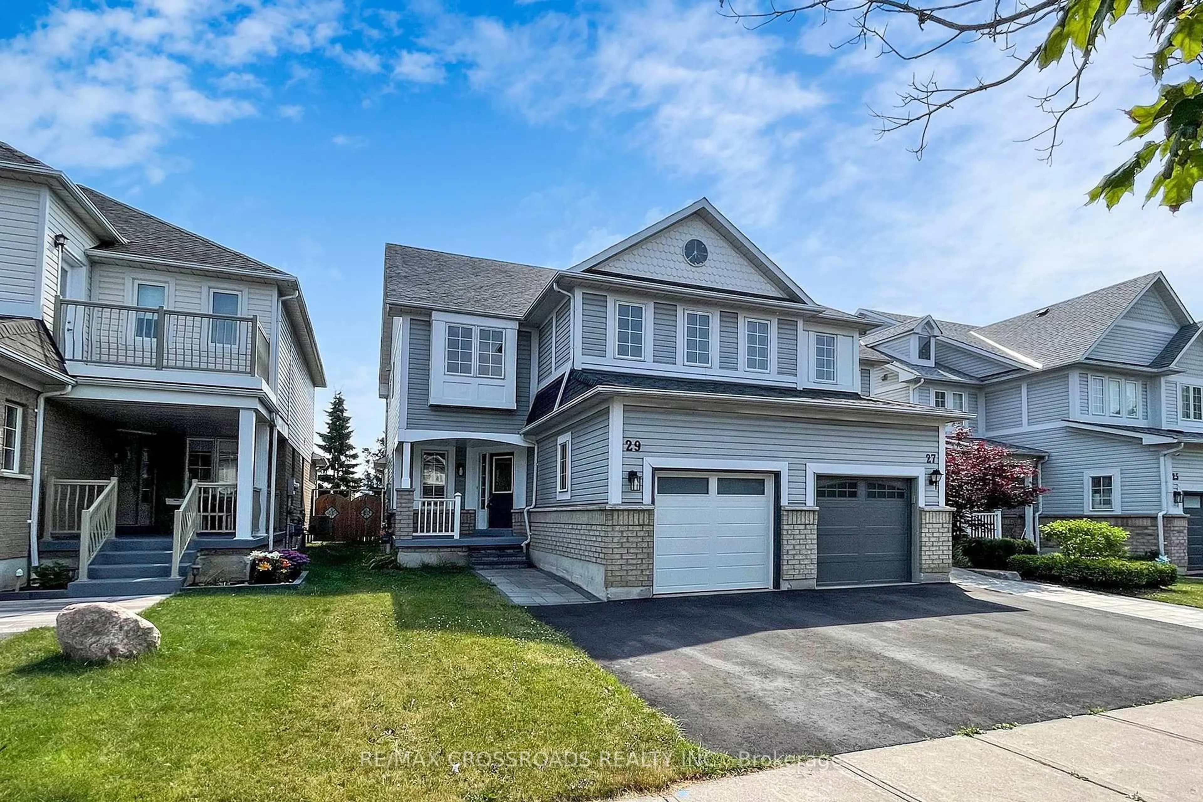 Home with vinyl exterior material, street for 29 Regatta Cres, Whitby Ontario L1N 9V2