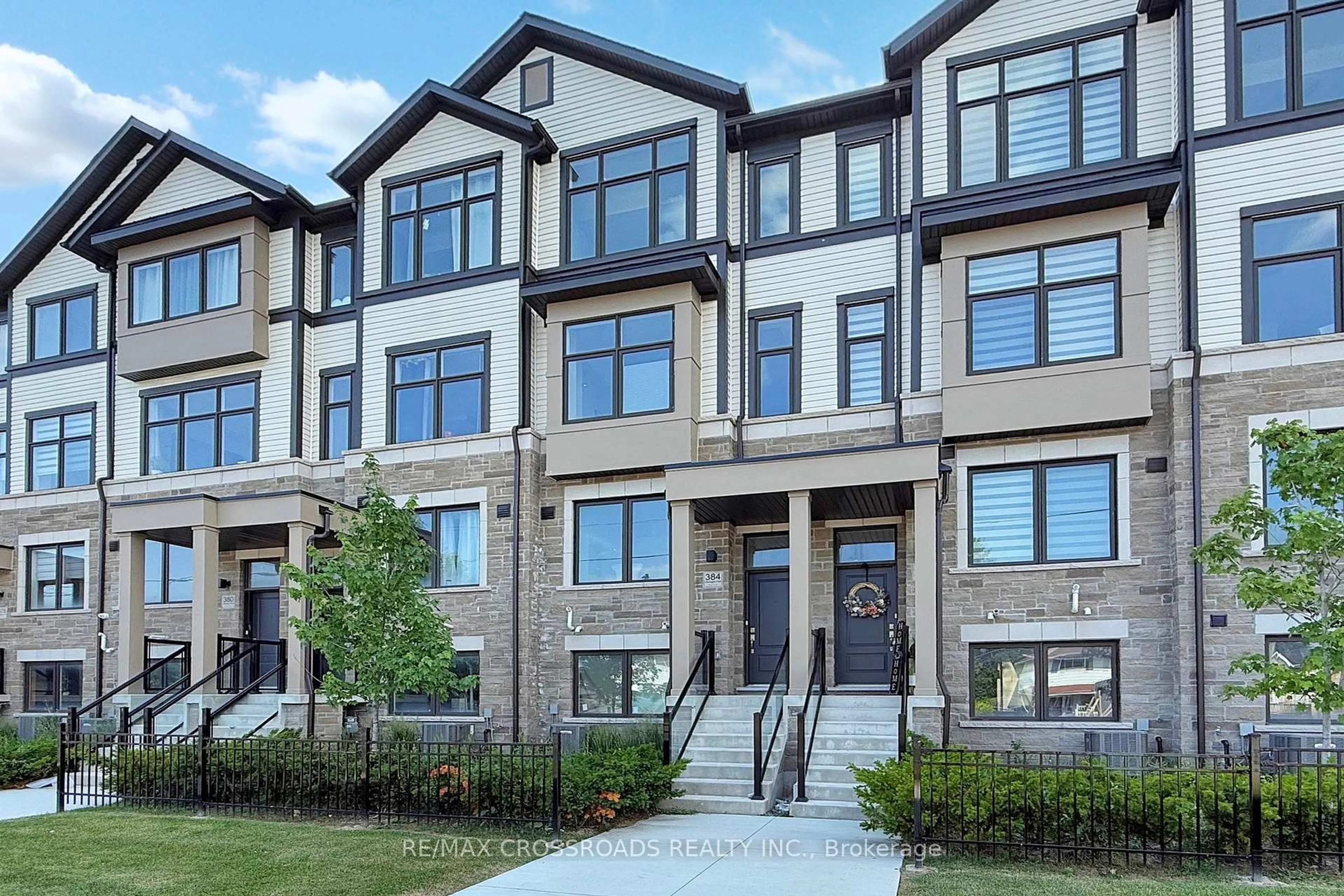 Home with brick exterior material, street for 384 Okanagan Path, Oshawa Ontario L1H 0B1