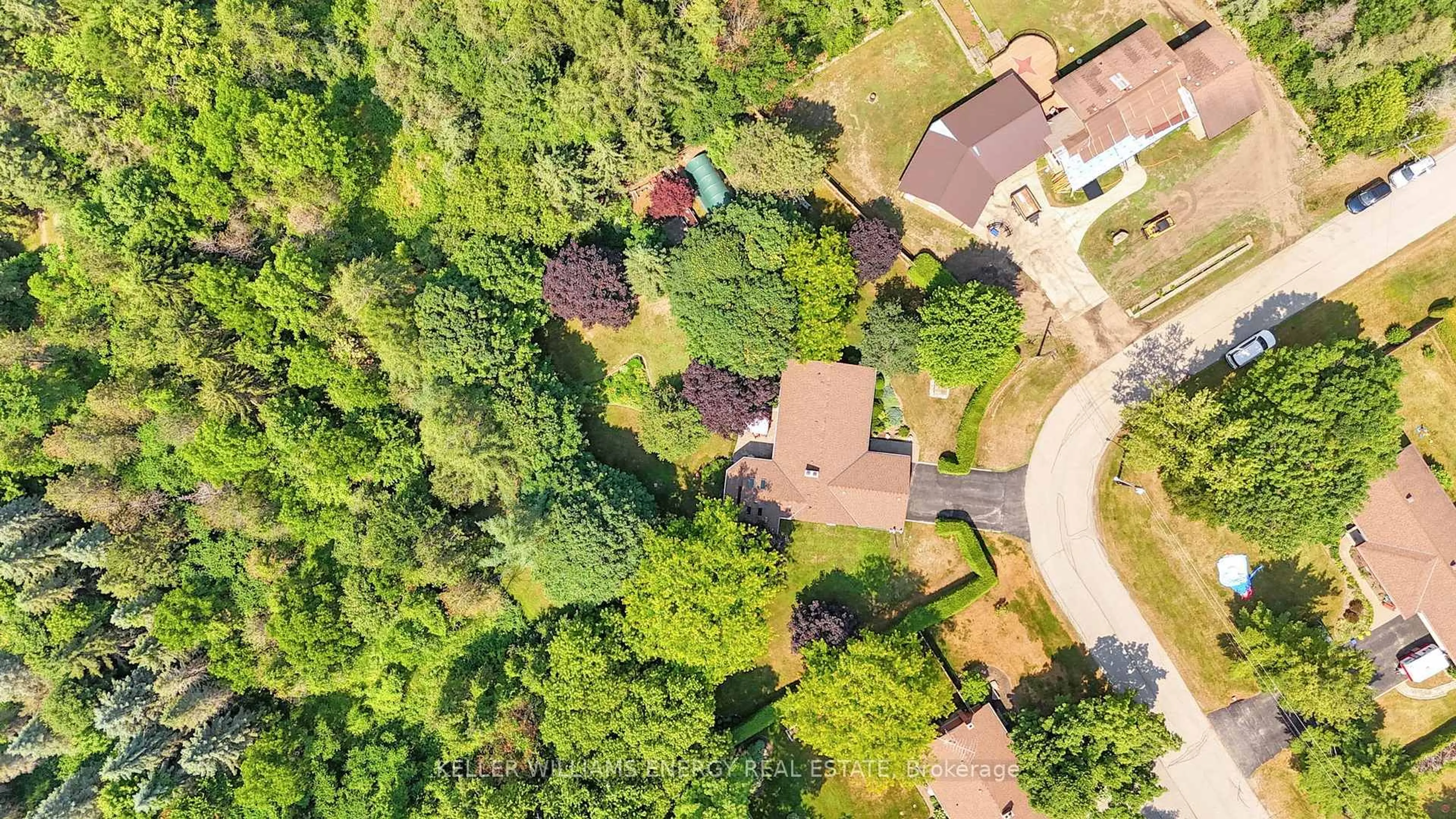 A pic from outside/outdoor area/front of a property/back of a property/a pic from drone, forest/trees view for 54 Irwin Rd, Clarington Ontario L0B 1M0