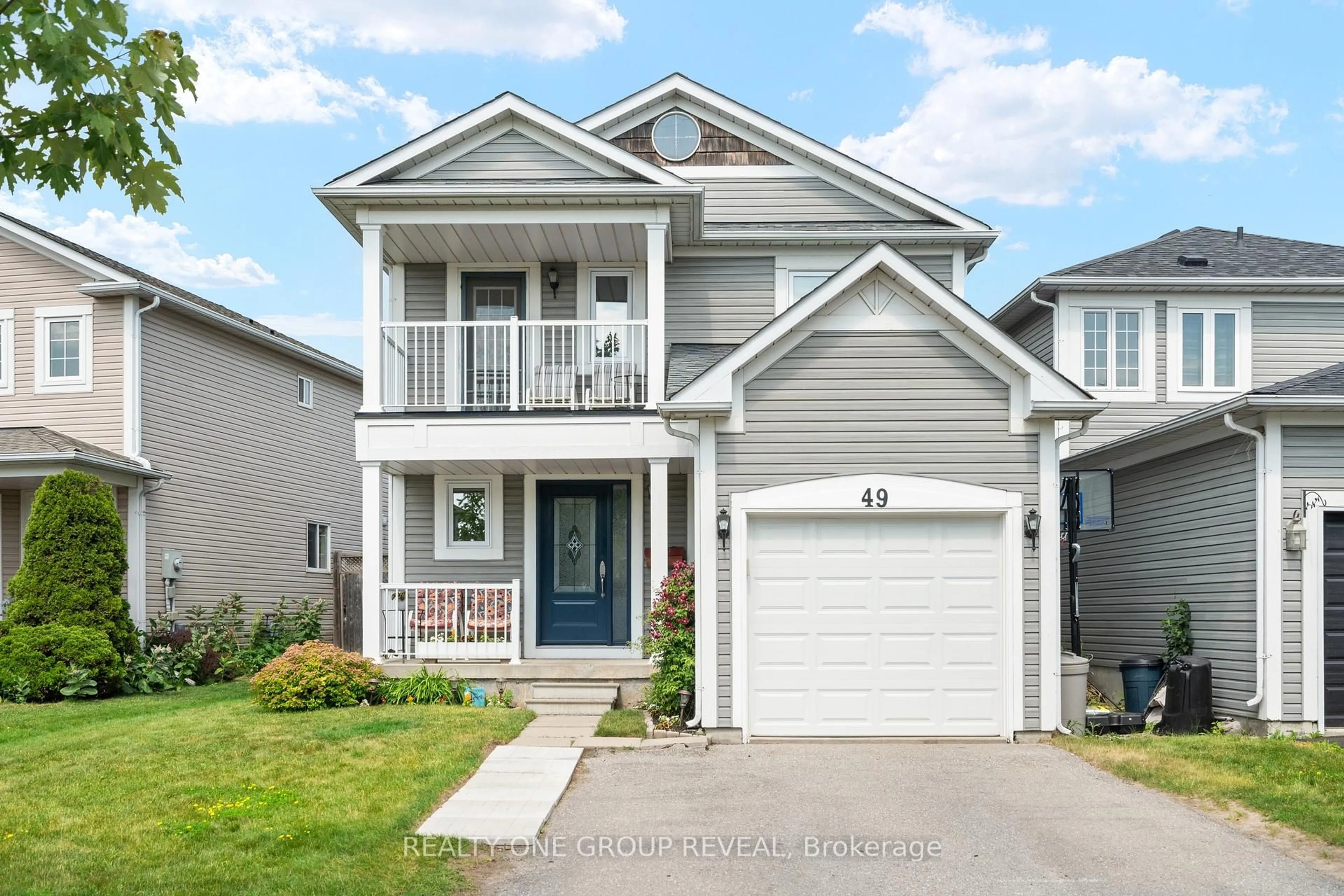 Home with vinyl exterior material, street for 49 Hammond St, Clarington Ontario L1C 5E5