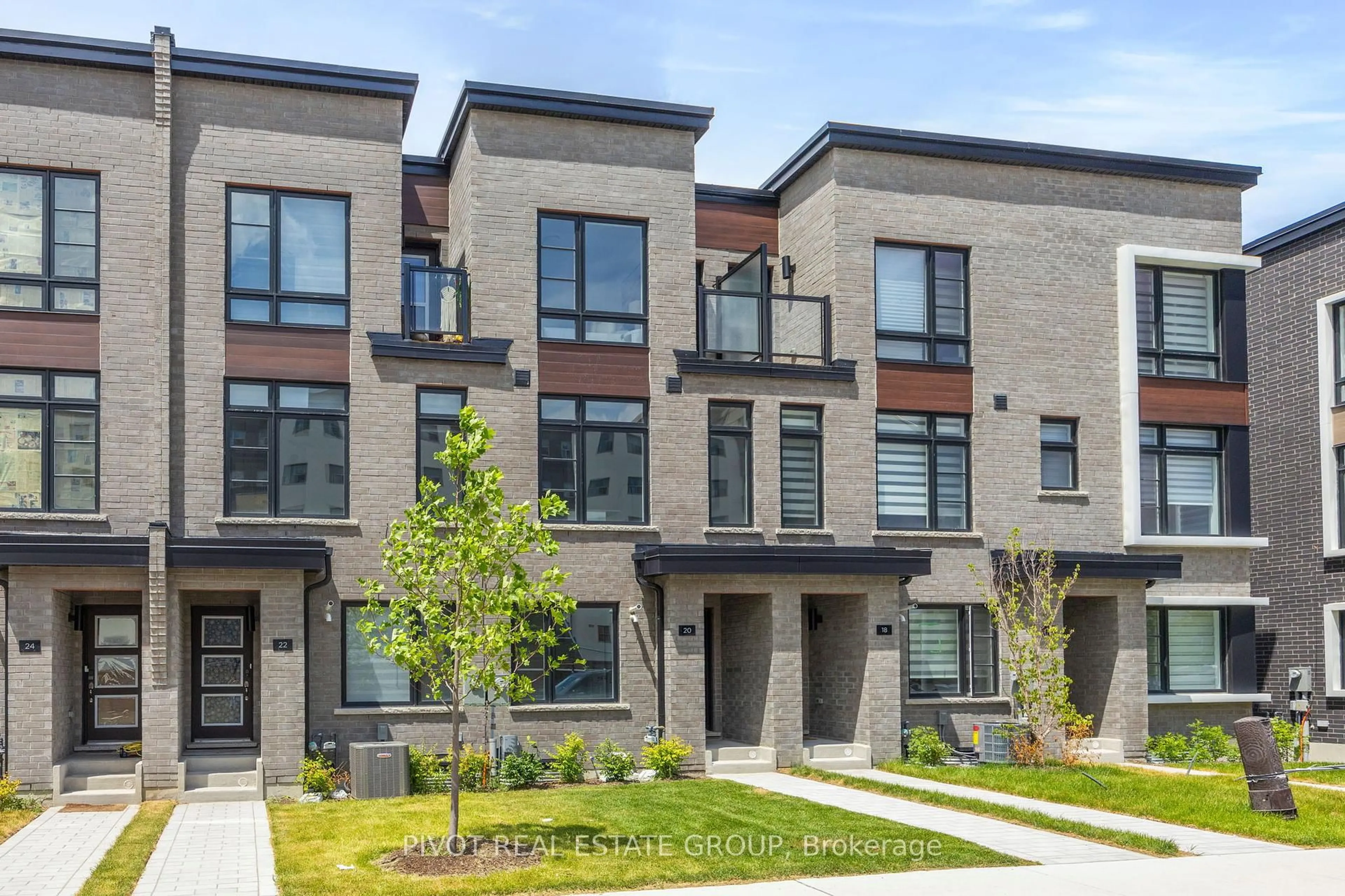 Home with brick exterior material, street for 20 Akil Thomas Gdns, Toronto Ontario M1P 0G3