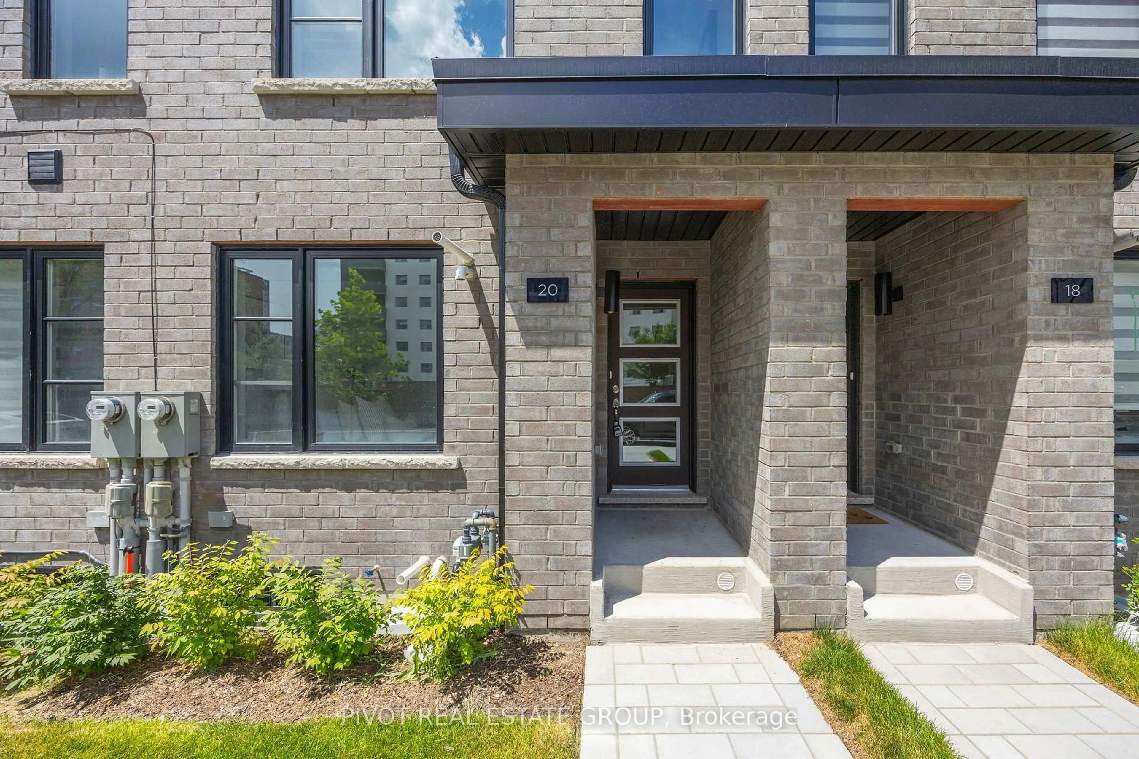 Home with brick exterior material, street for 20 Akil Thomas Gdns, Toronto Ontario M1P 0G3