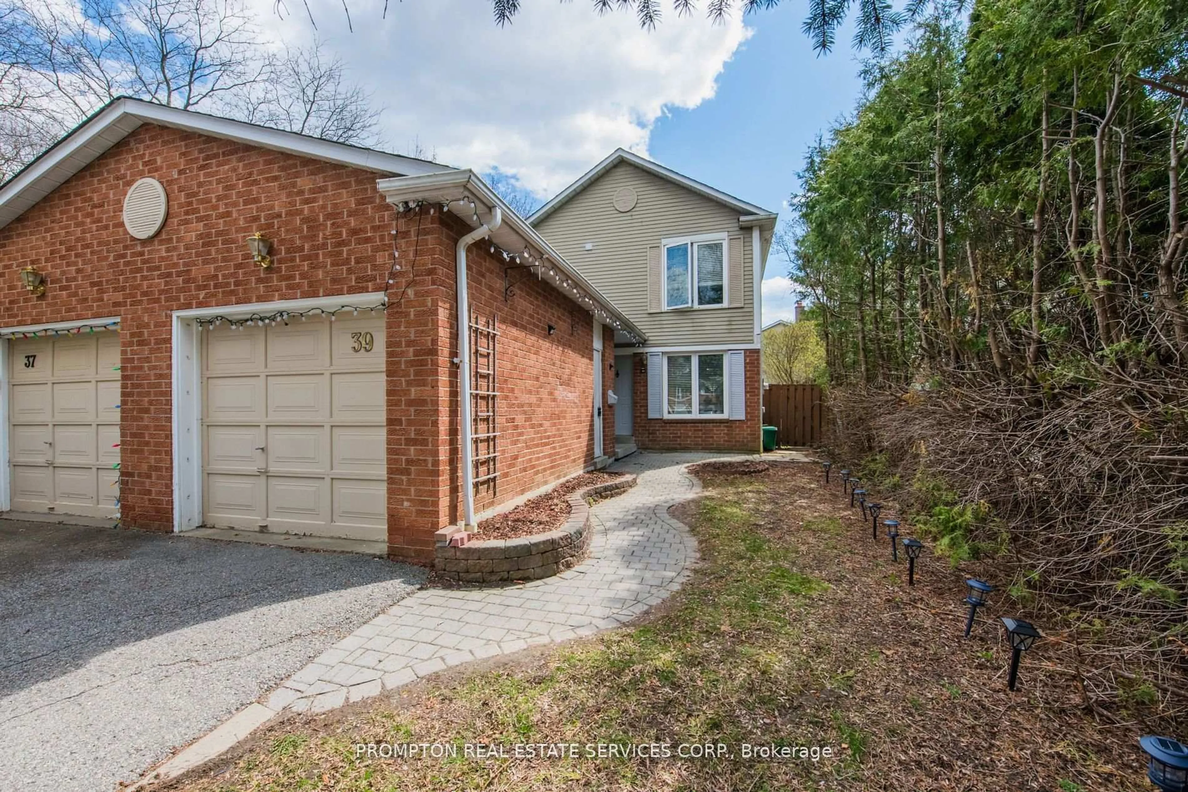 Home with brick exterior material, street for 39 Frost Dr, Whitby Ontario L1P 1C8