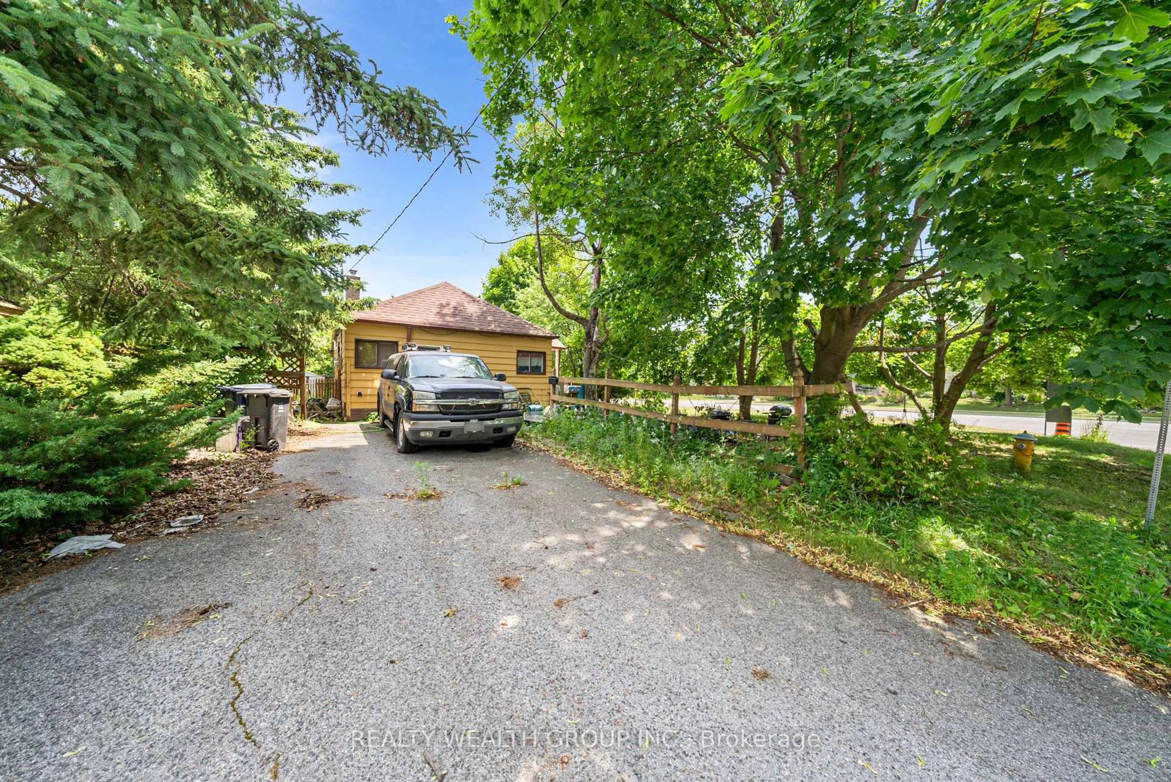 A pic from outside/outdoor area/front of a property/back of a property/a pic from drone, street for 4450 Lawrence Ave, Toronto Ontario M1E 2T9