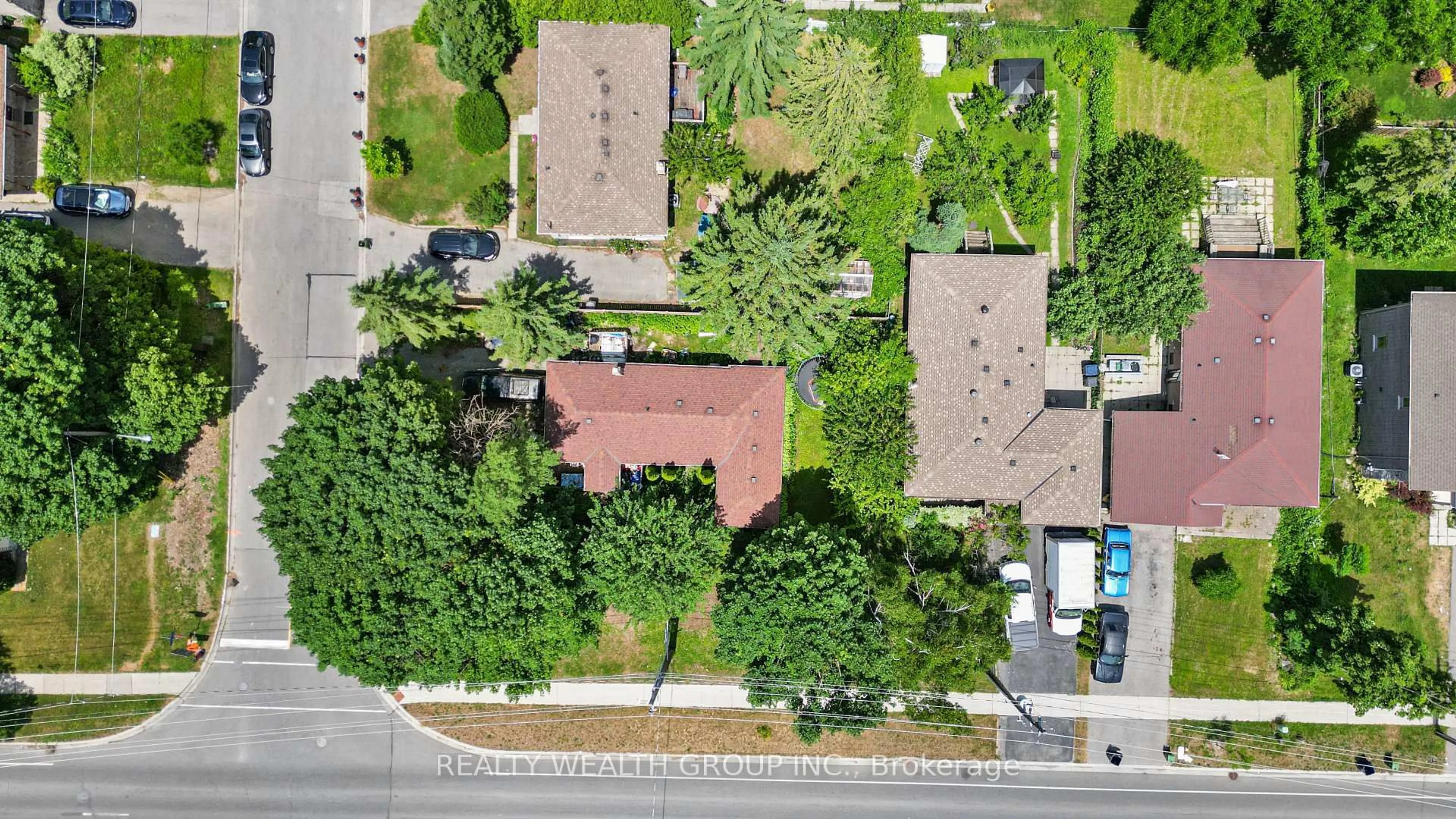 A pic from outside/outdoor area/front of a property/back of a property/a pic from drone, street for 4450 Lawrence Ave, Toronto Ontario M1E 2T9