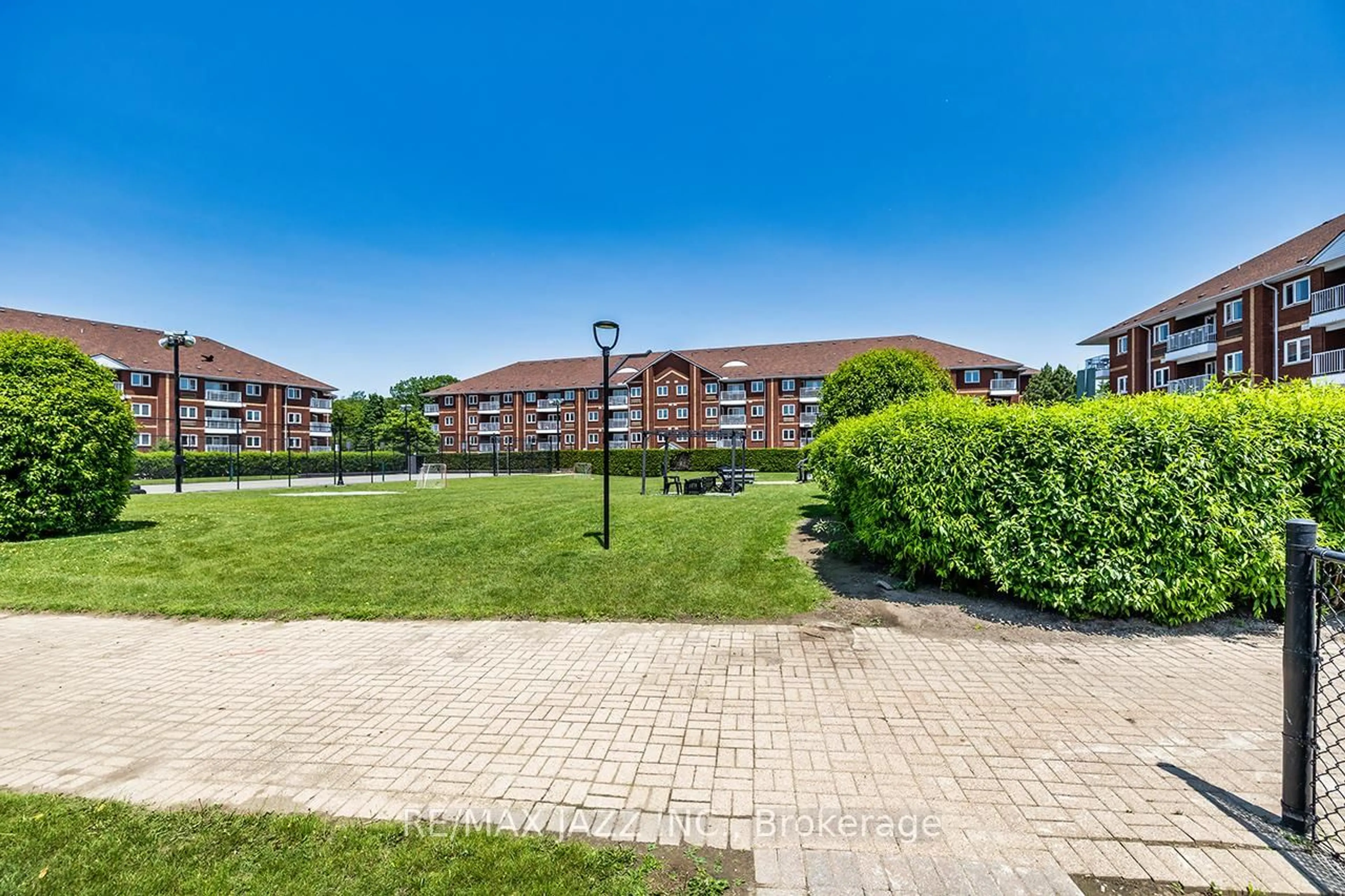 A pic from outside/outdoor area/front of a property/back of a property/a pic from drone, street for 195 Lake Driveway #411, Ajax Ontario L1S 7H7