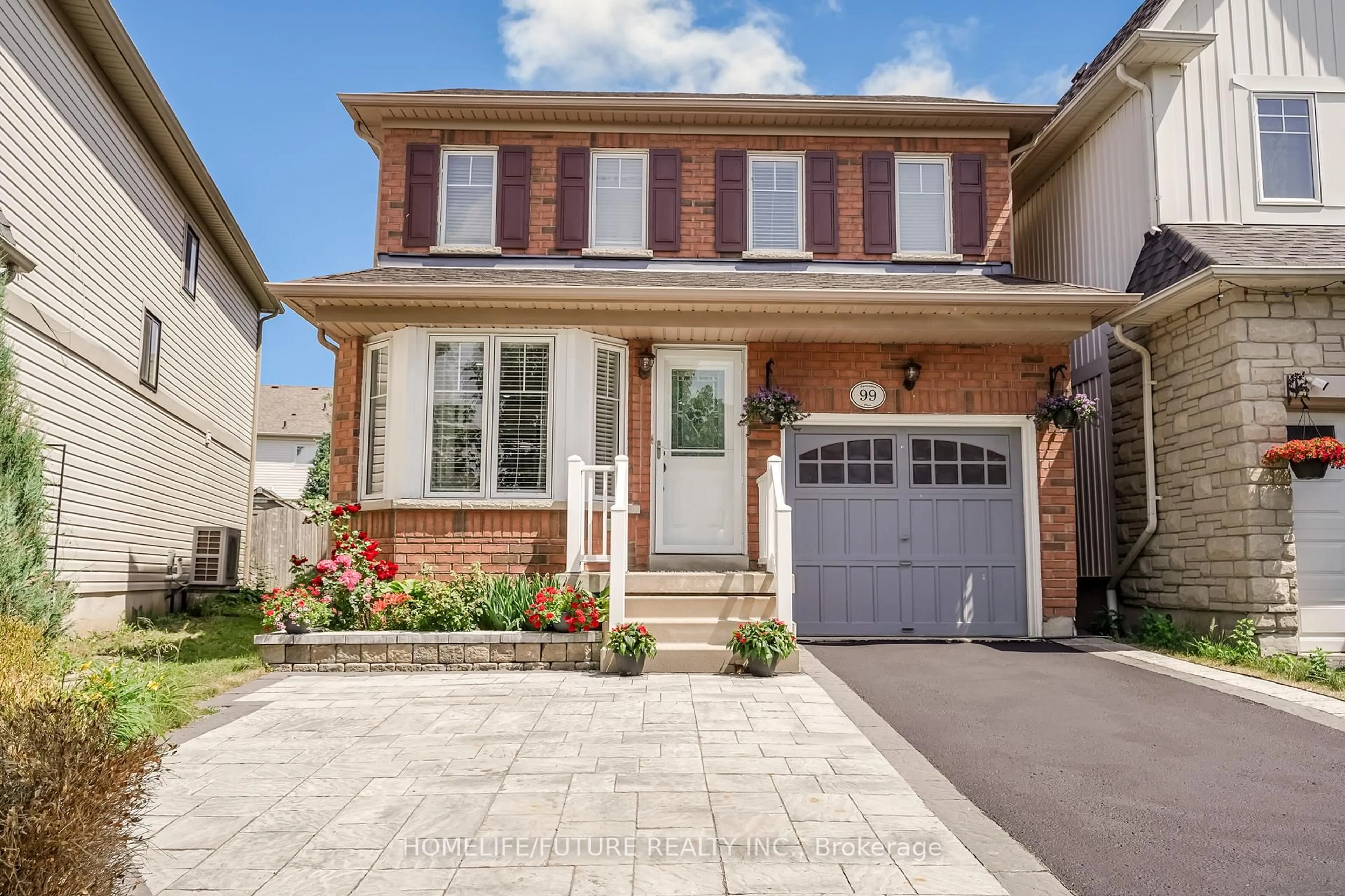 Home with brick exterior material, street for 99 Harrongate Pl, Whitby Ontario L1R 3E5