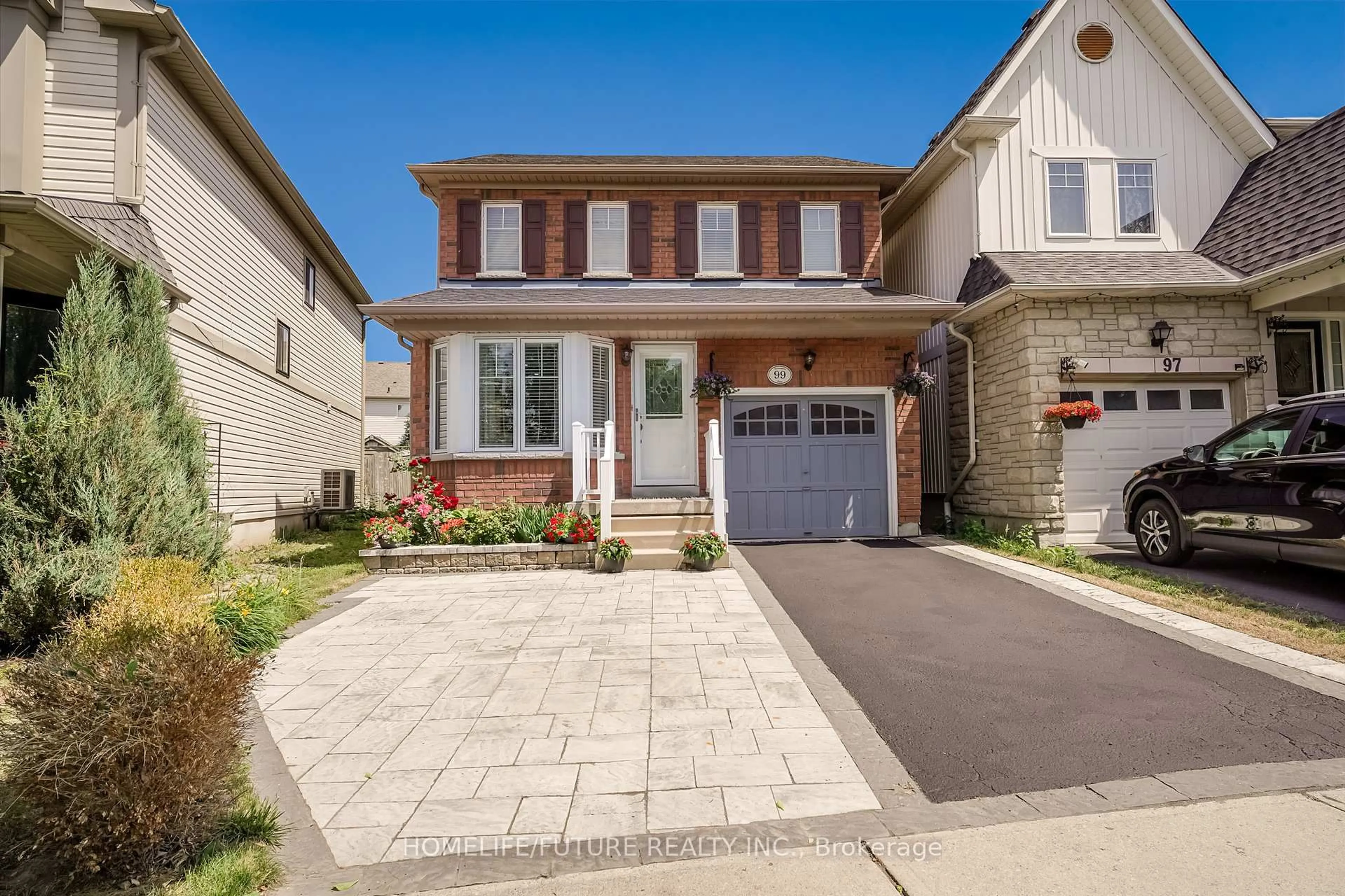 Home with brick exterior material, street for 99 Harrongate Pl, Whitby Ontario L1R 3E5