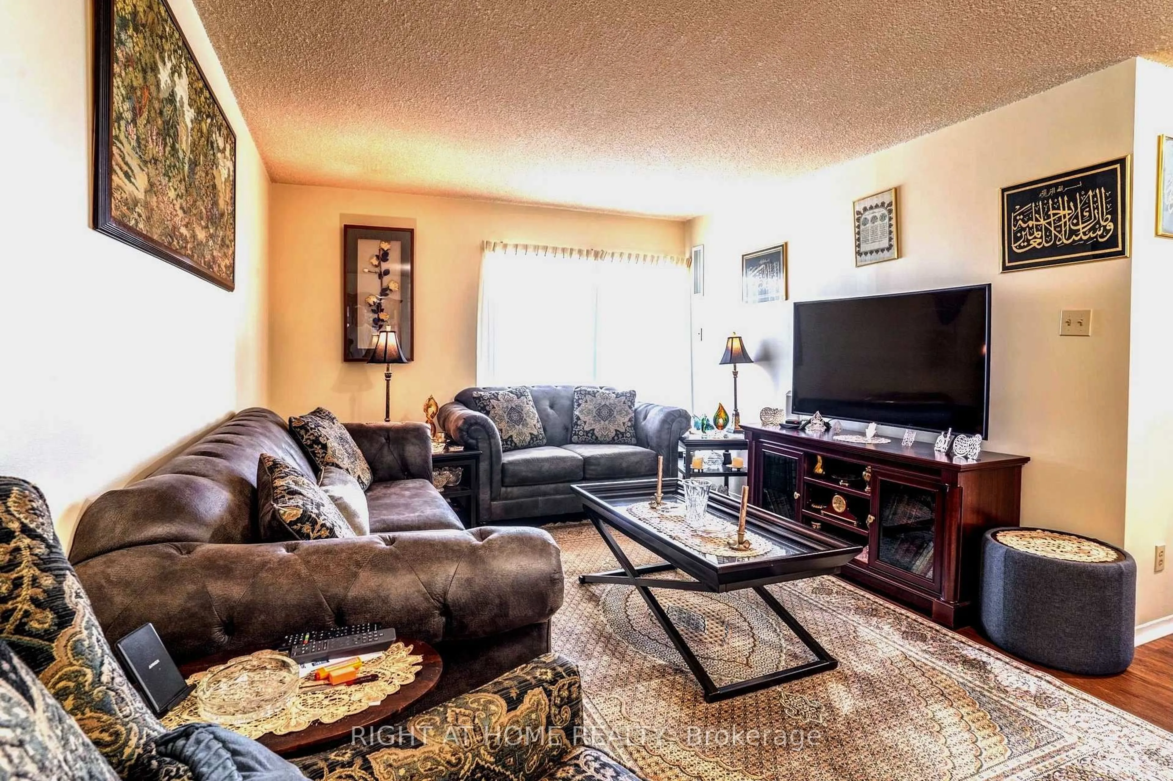 Living room with furniture, unknown for 11753 Sheppard Ave #1110, Toronto Ontario M1B 5M3