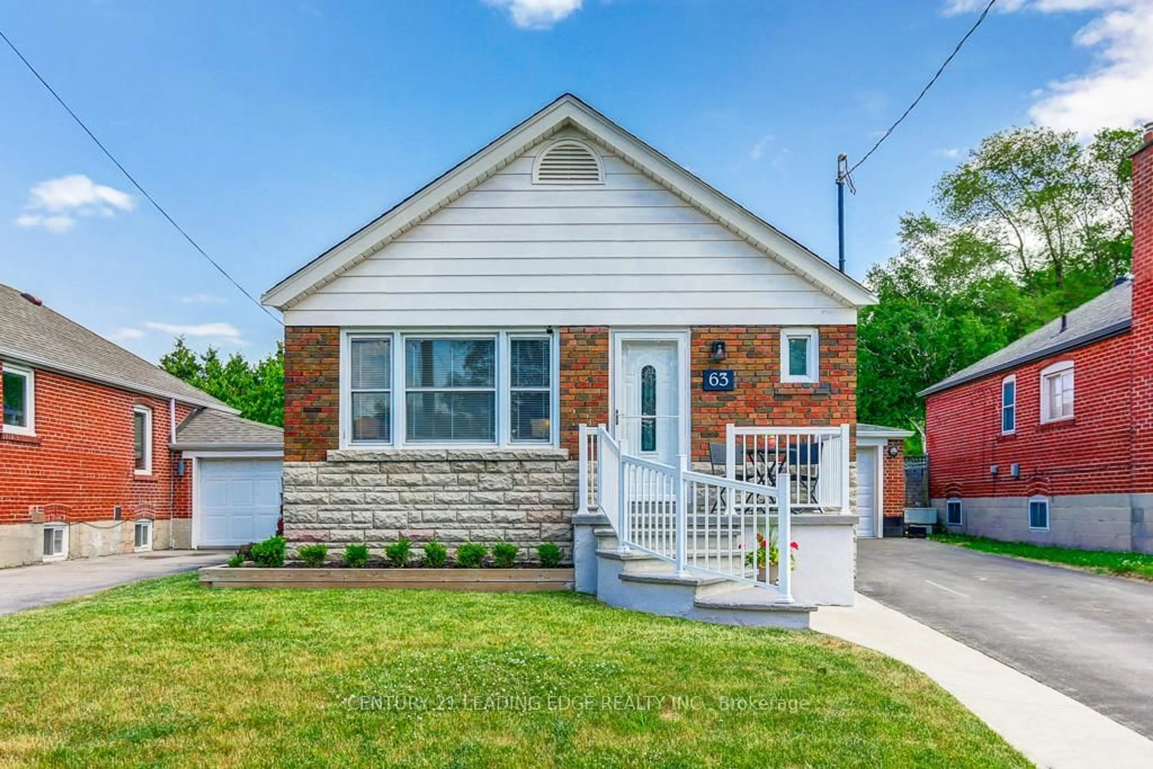 Home with brick exterior material, street for 63 DELWOOD Dr, Toronto Ontario M1L 2S8