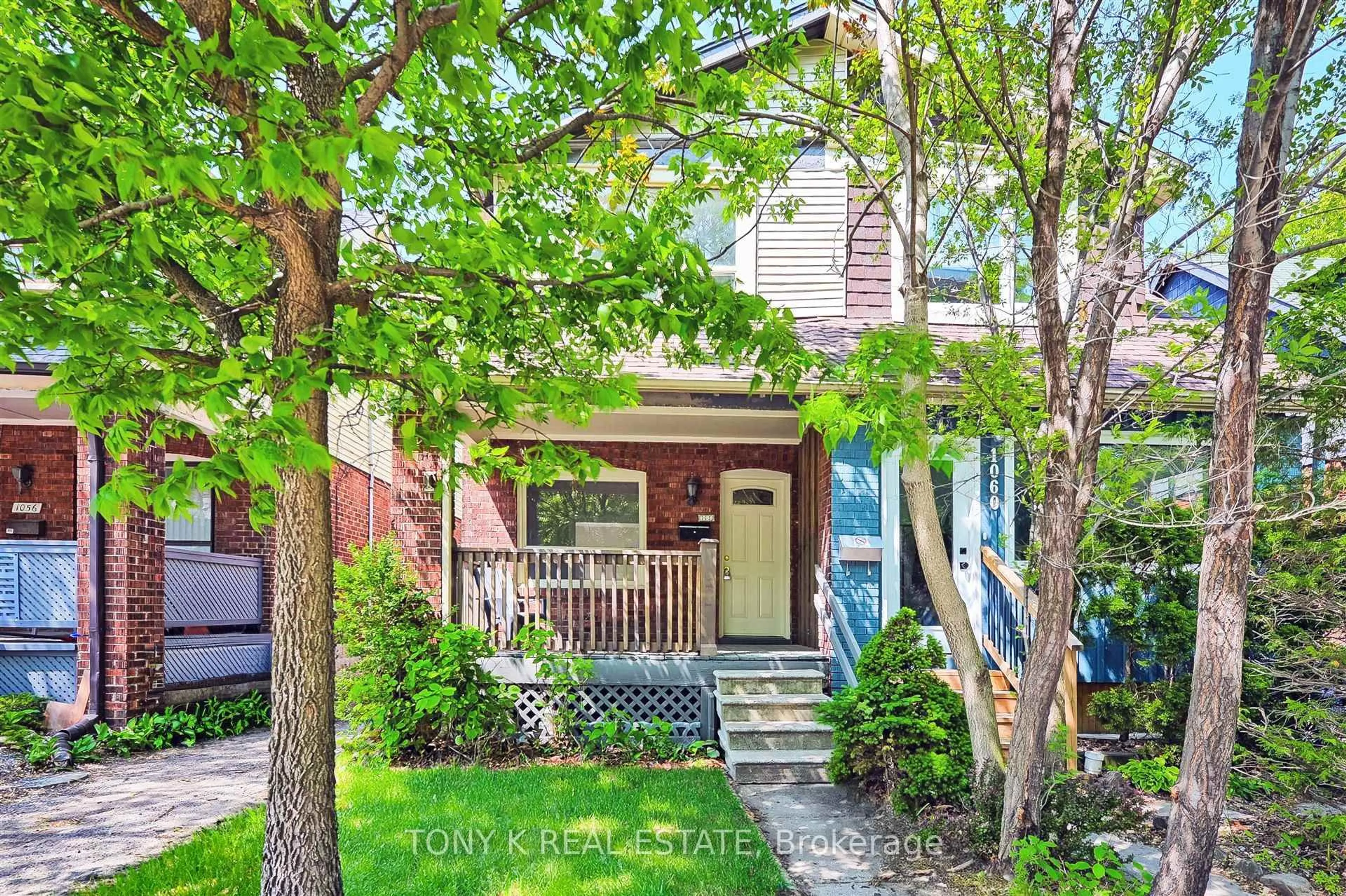 Home with brick exterior material, street for 1058 Woodbine Ave, Toronto Ontario M4C 4C5
