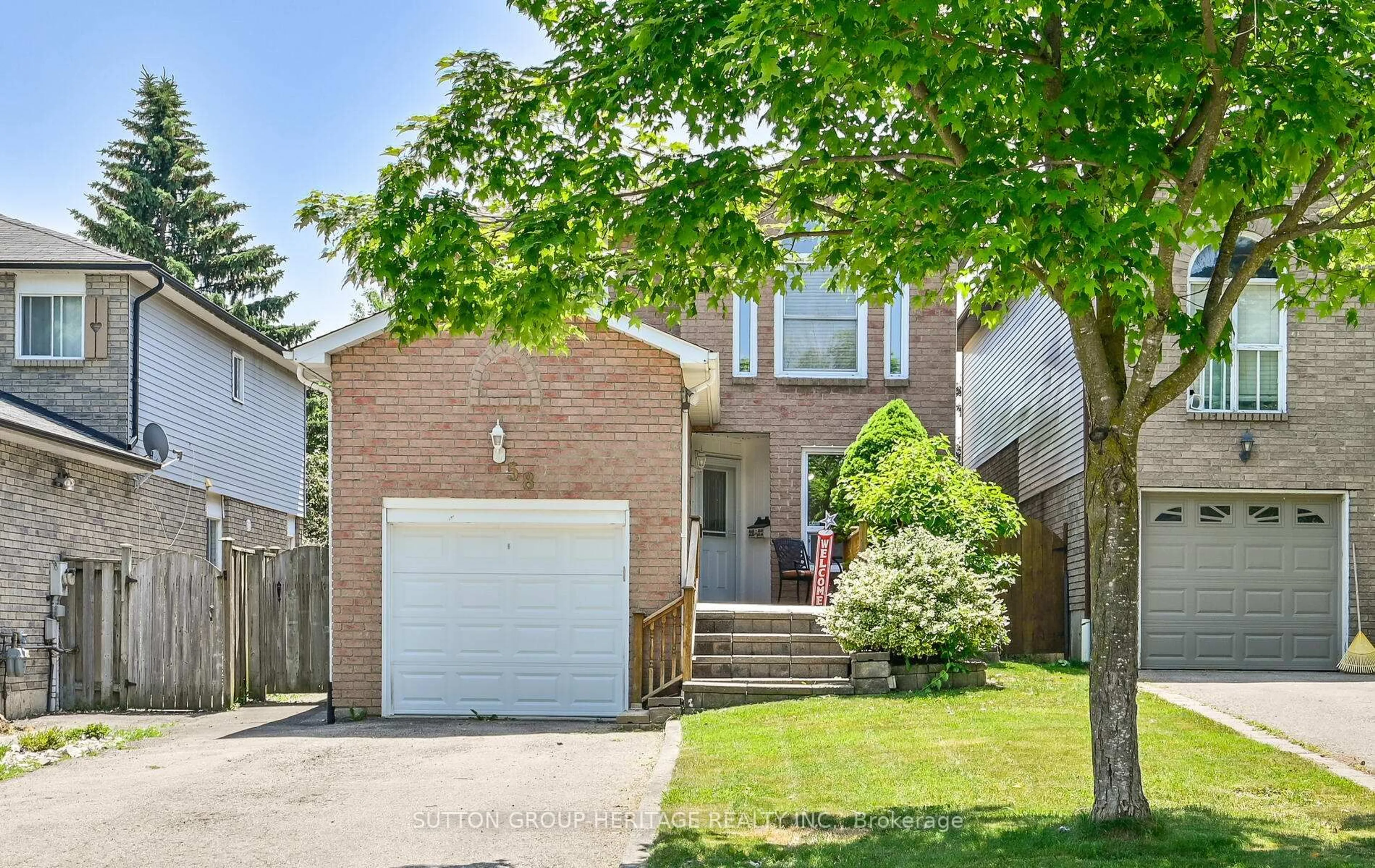 Home with brick exterior material, street for 58 Goldring Dr, Whitby Ontario L1P 1C1