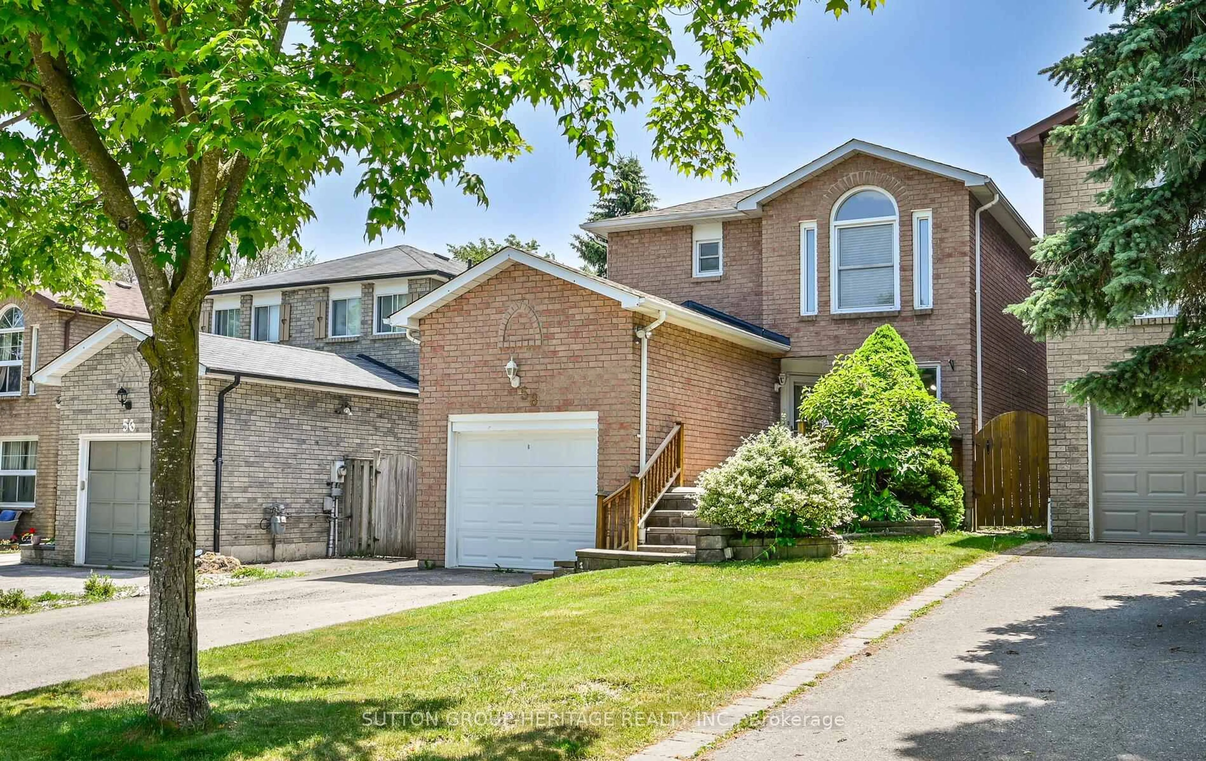 Home with brick exterior material, street for 58 Goldring Dr, Whitby Ontario L1P 1C1