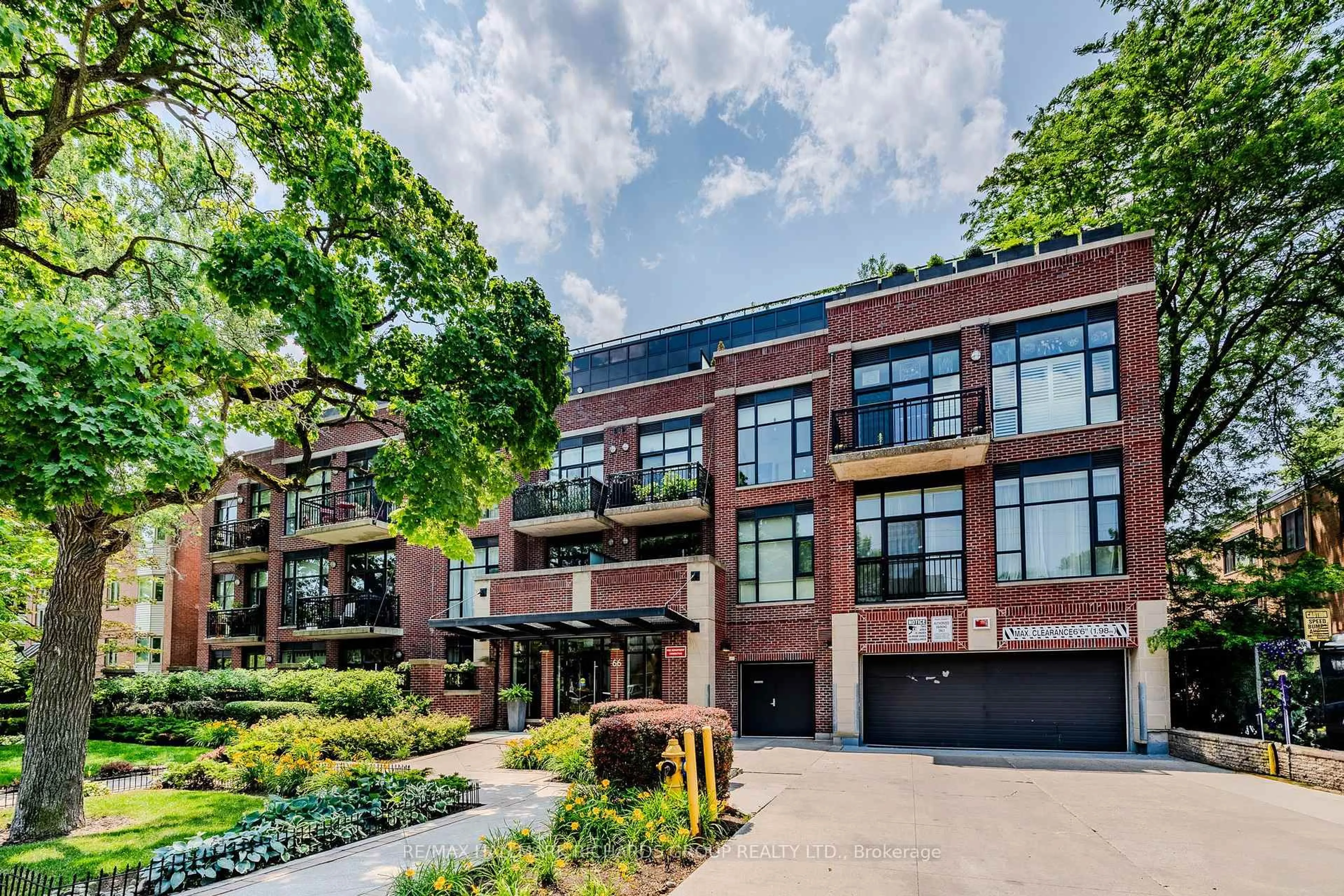 Home with brick exterior material, street for 66 Kippendavie Ave #215, Toronto Ontario M4L 0A4
