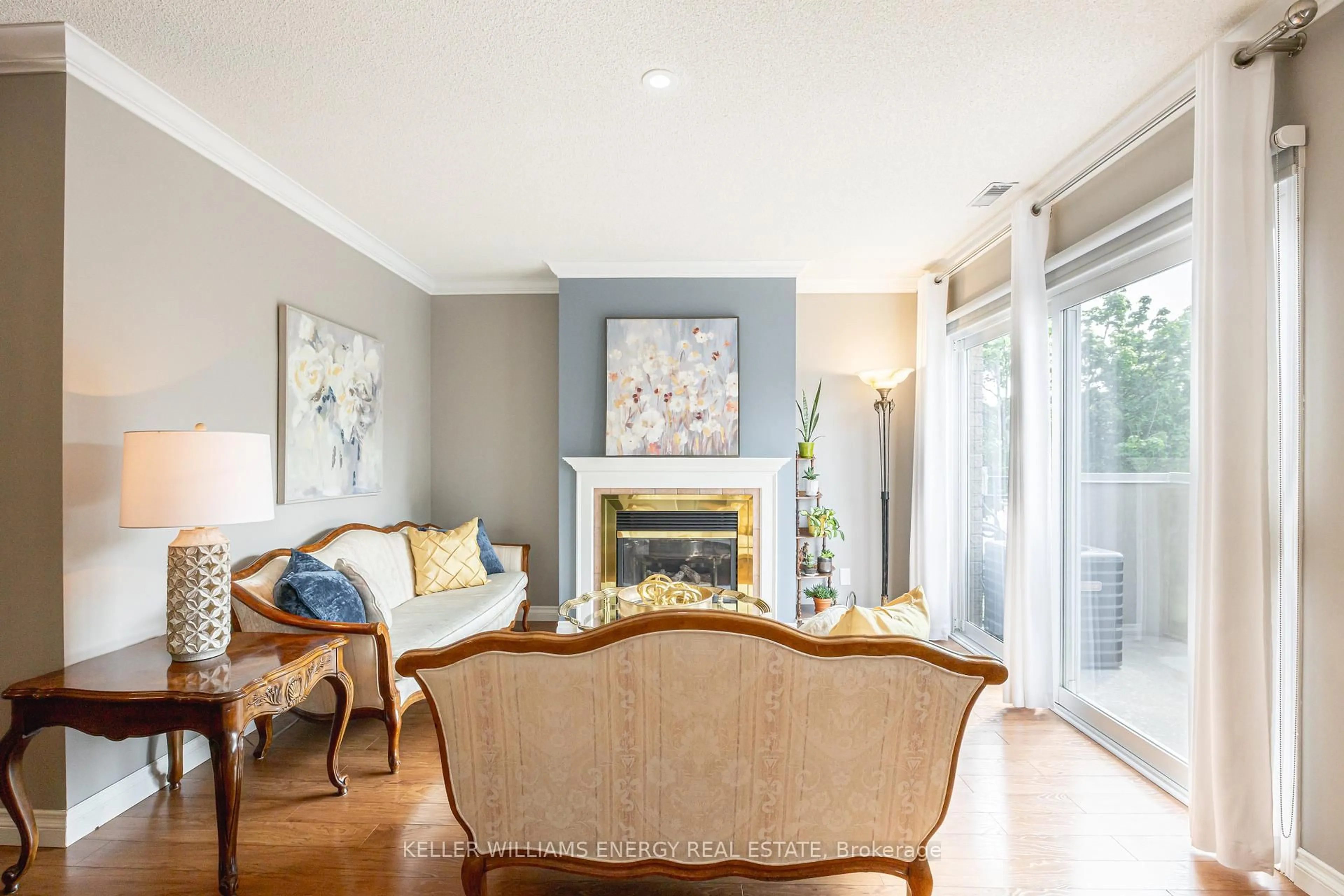 Living room with furniture, wood/laminate floor for 1400 The Esplanade #809, Pickering Ontario L1V 6V2