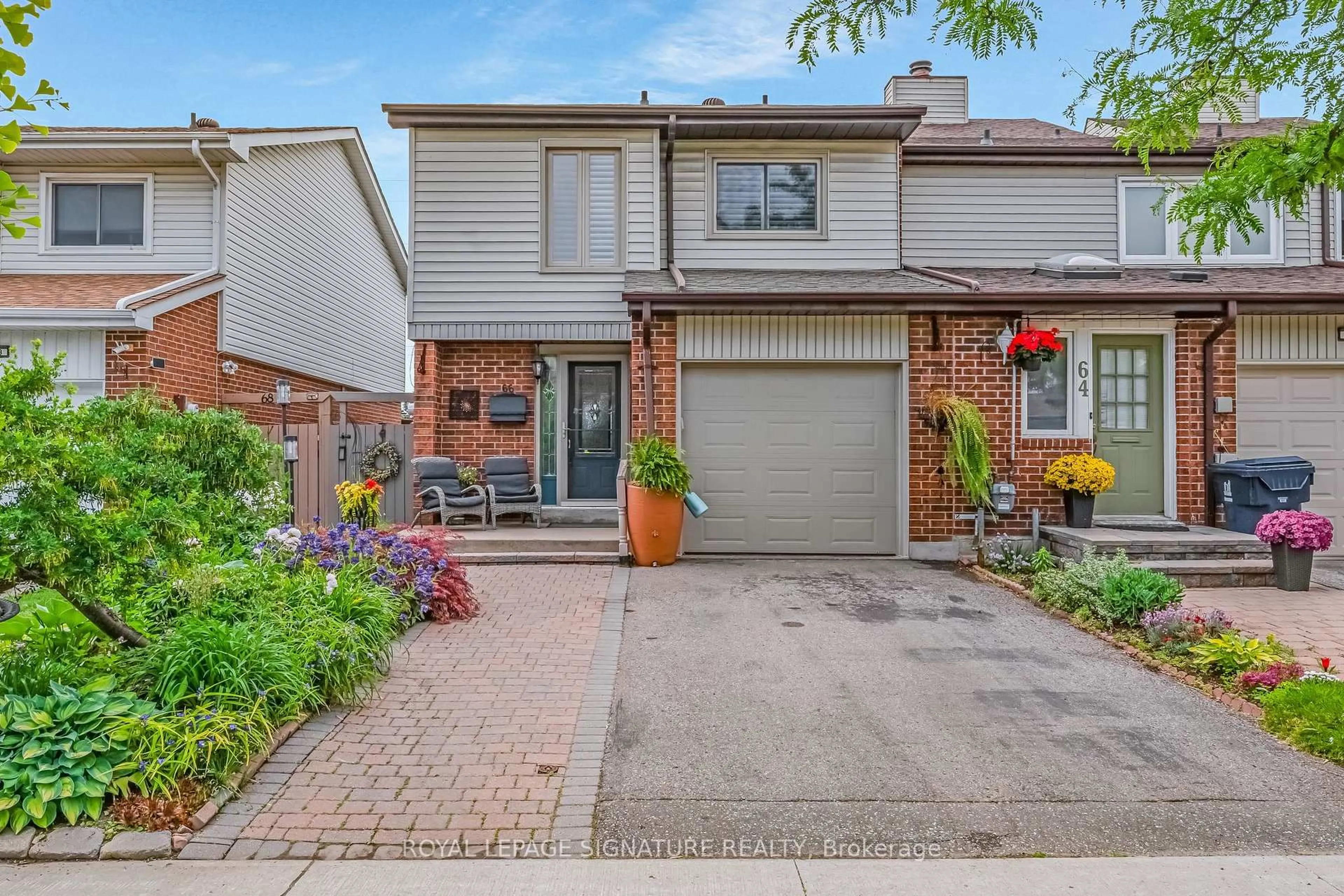 Home with brick exterior material, street for 66 Springhouse Sq, Toronto Ontario M1W 2X1