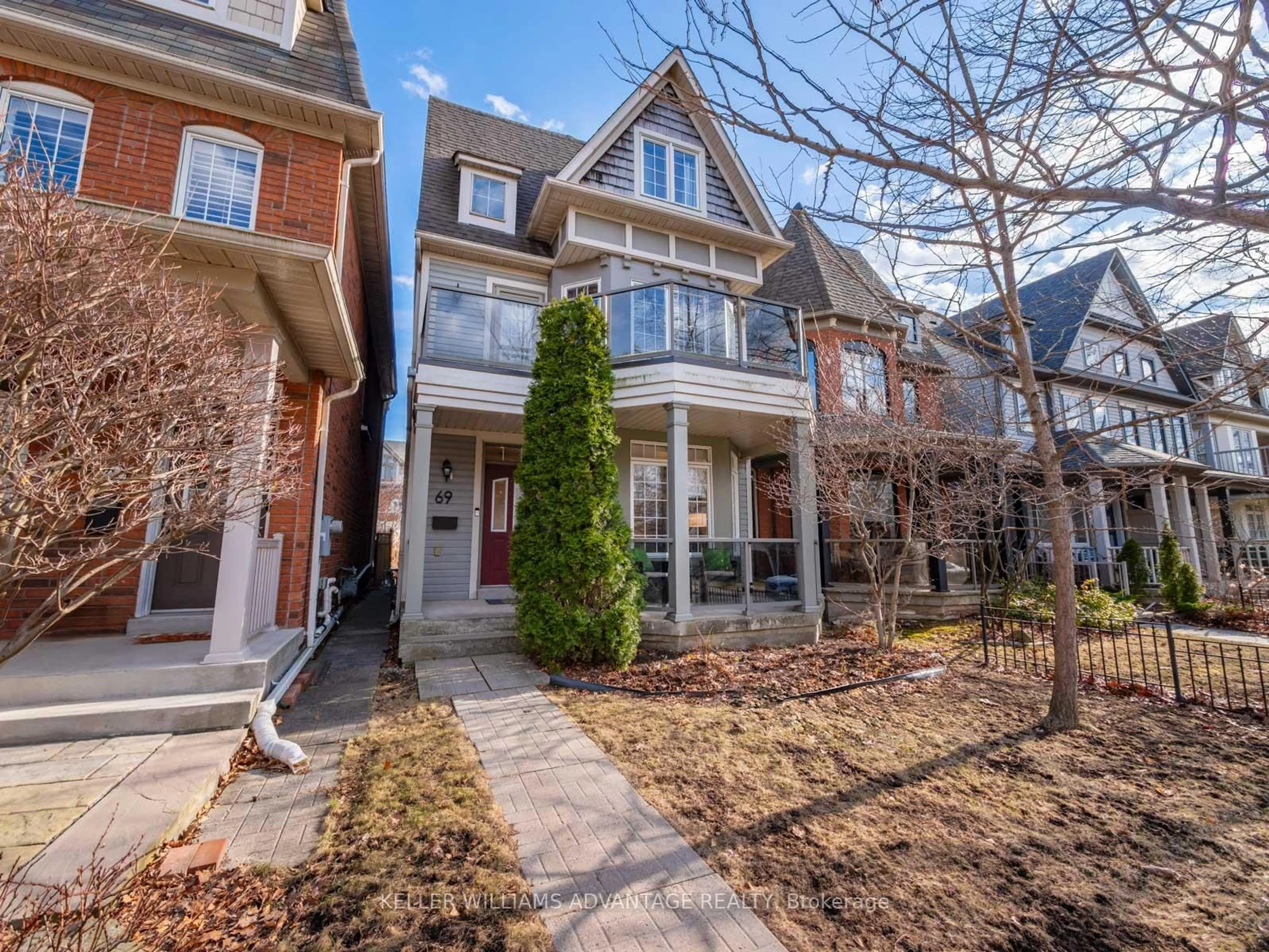 Home with brick exterior material, street for 69 Boardwalk Dr, Toronto Ontario M4L 3Z4