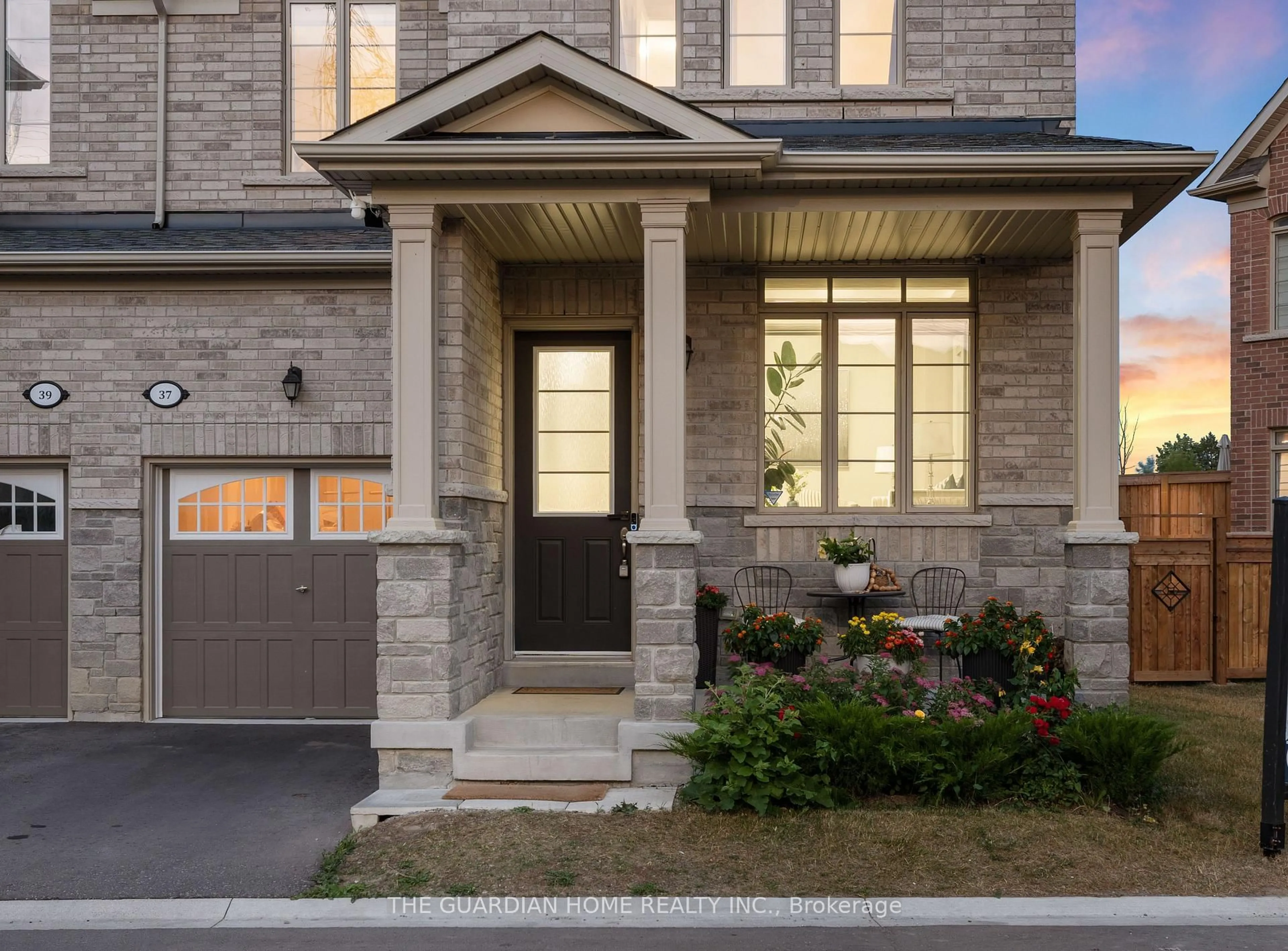 Home with brick exterior material, street for 37 Hickling Lane, Ajax Ontario L1T 0P9