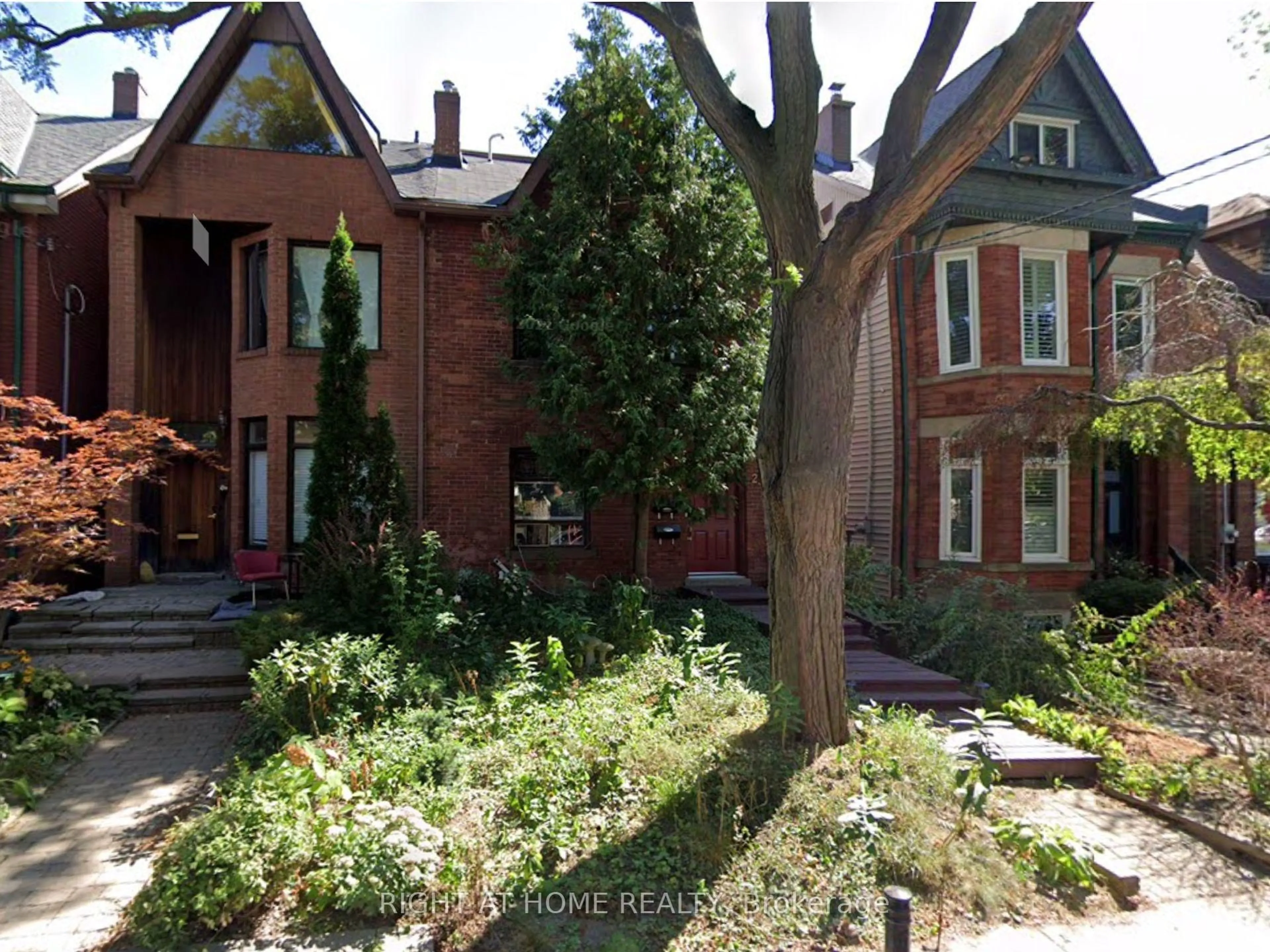 Home with brick exterior material, street for 23 First Ave, Toronto Ontario M4M 1W7