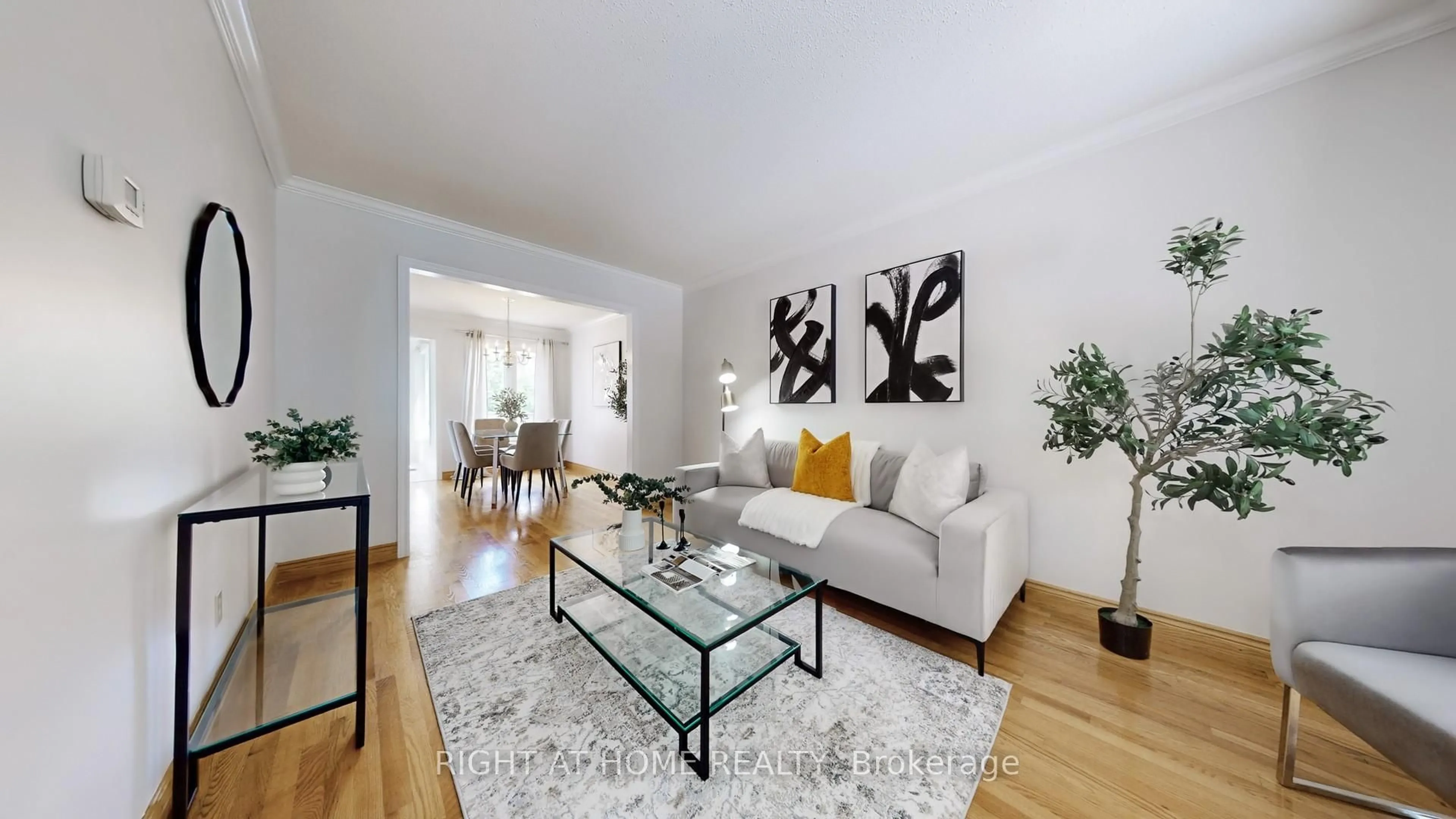 Living room with furniture, wood/laminate floor for 48 Fishery Rd, Toronto Ontario M1C 3R7