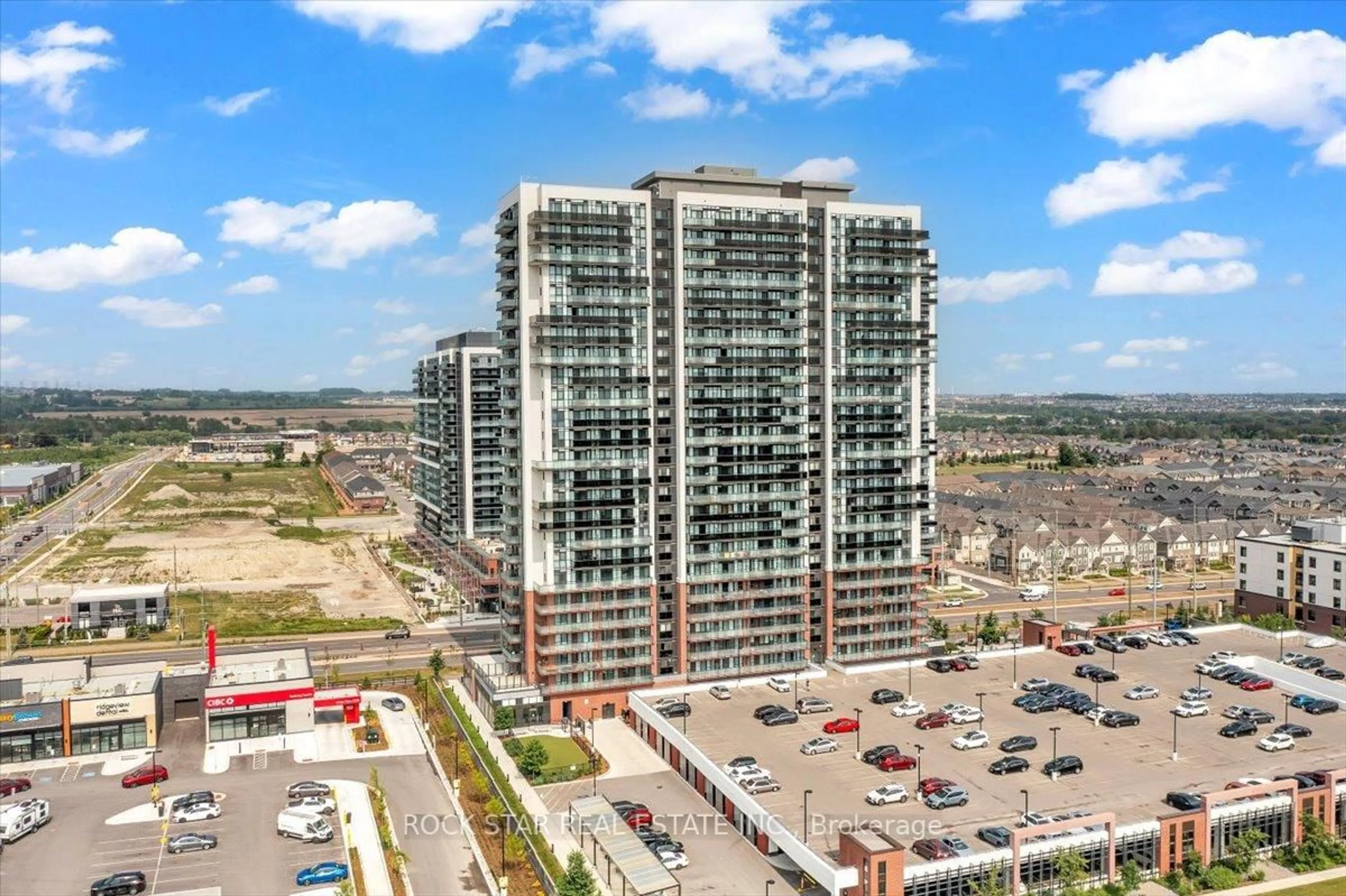 A pic from outside/outdoor area/front of a property/back of a property/a pic from drone, city buildings view from balcony for 2550 Simcoe St #204, Oshawa Ontario L1L 0R5
