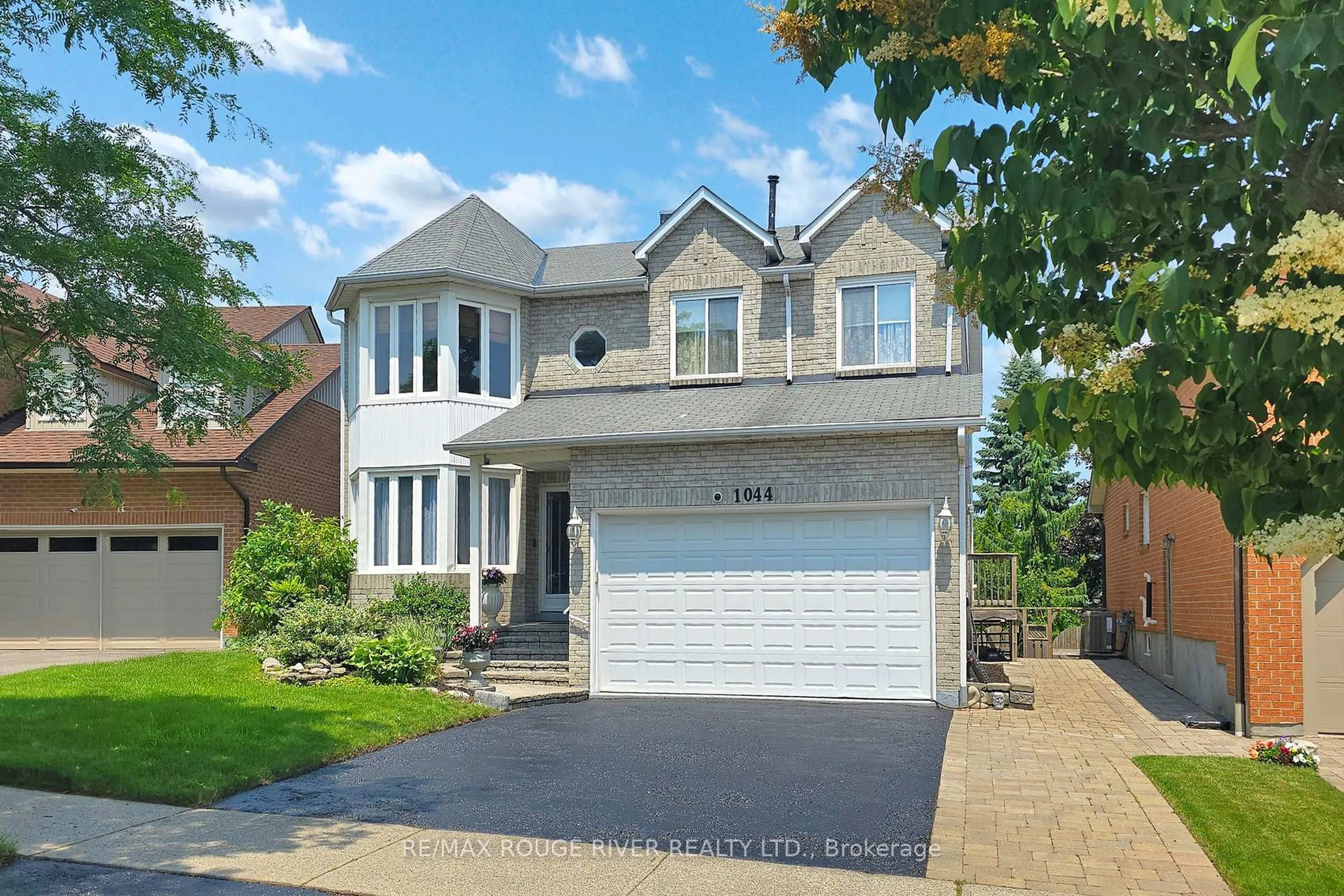 Home with brick exterior material, street for 1044 Rambleberry Ave, Pickering Ontario L1V 5X6