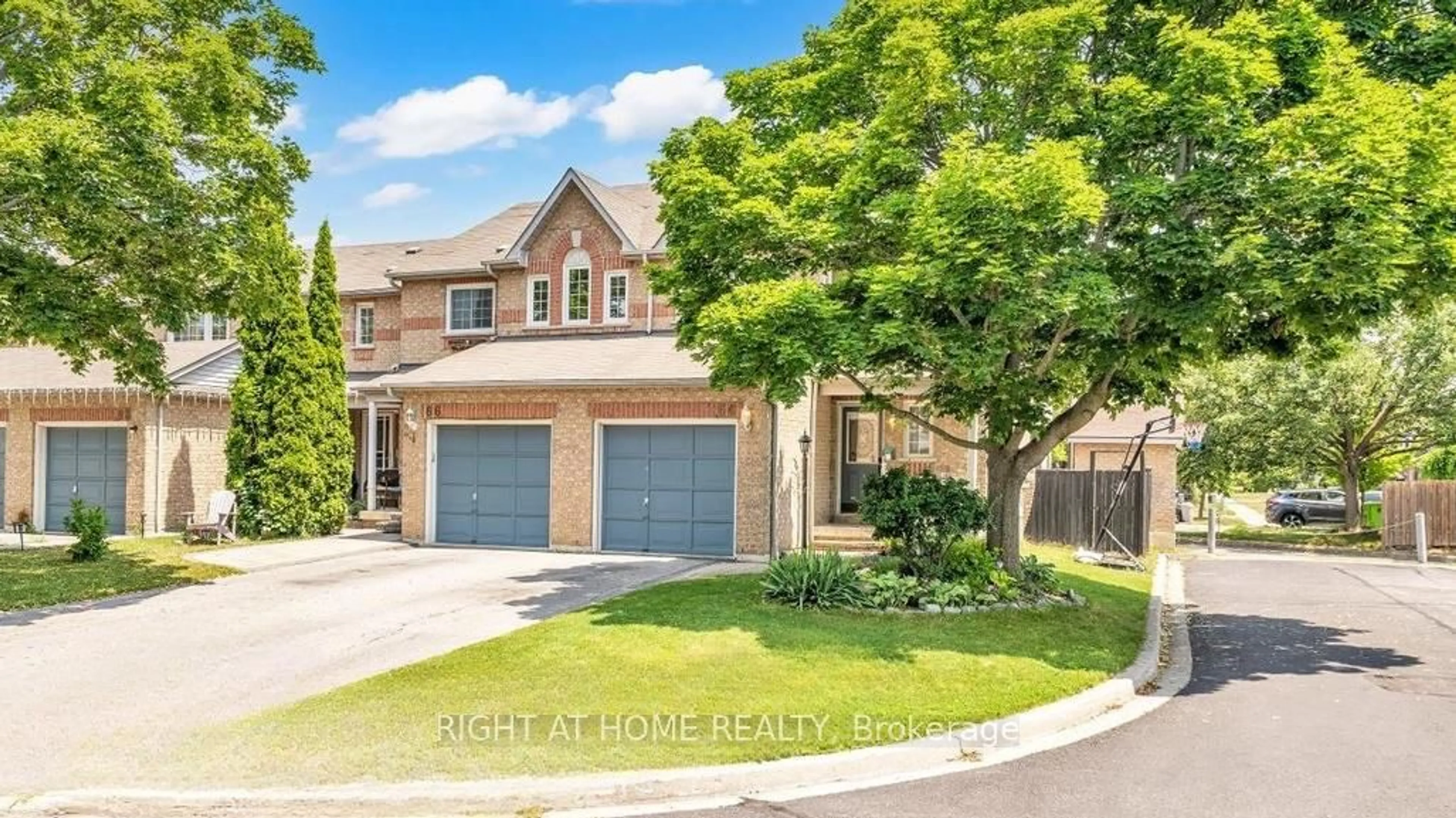 Home with brick exterior material, street for 64 Macintyre Lane, Ajax Ontario L1T 3X3